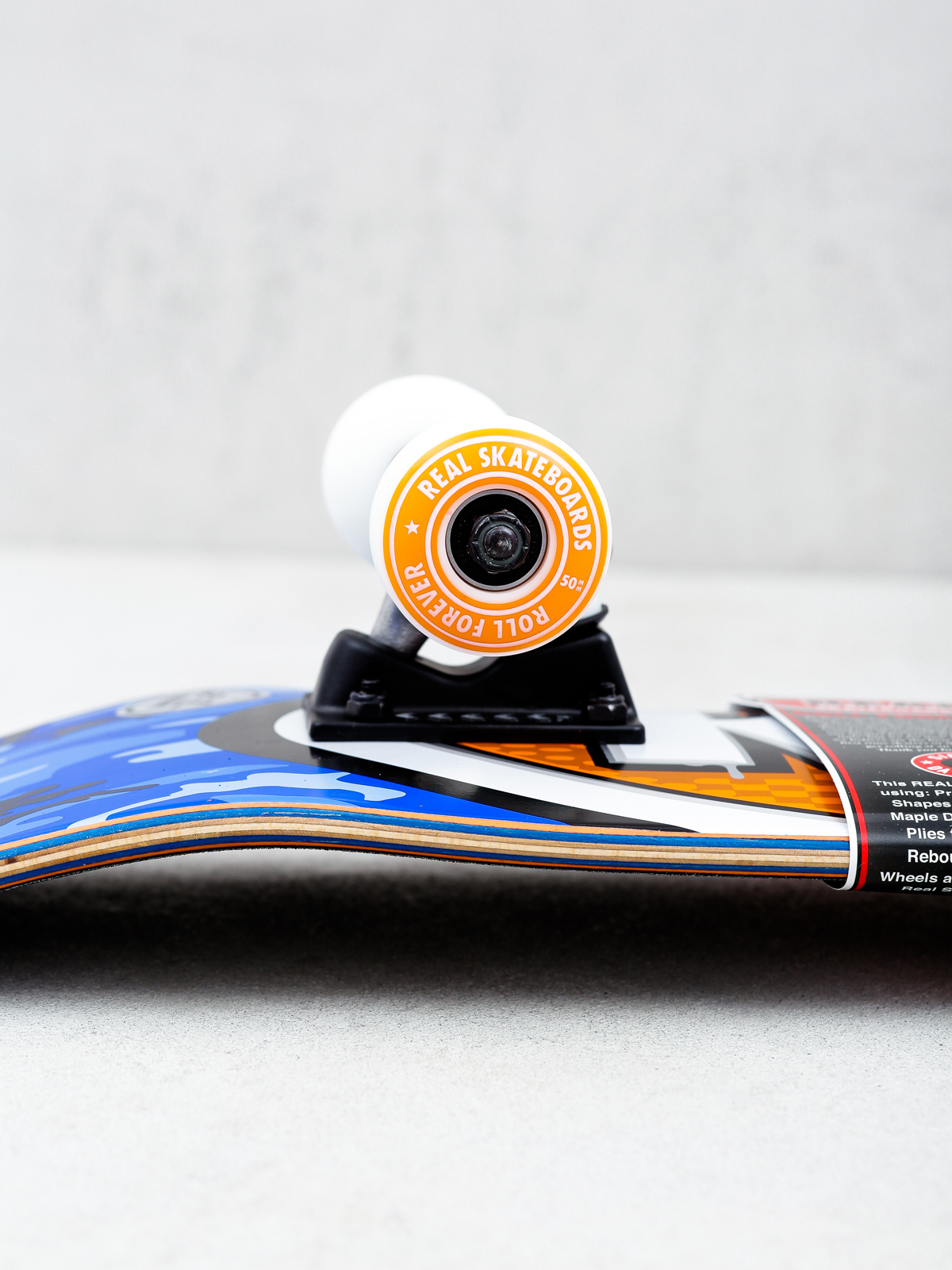 Deskorolka Real New Awol Ovals Mini (blue camo/orange)