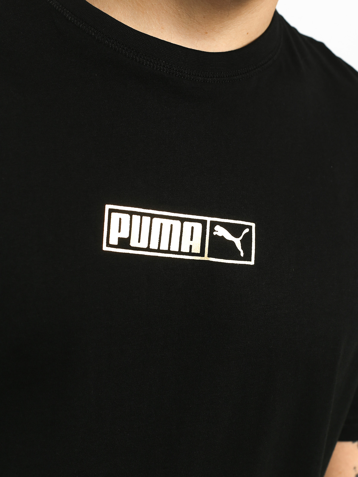 black and gold puma shirts