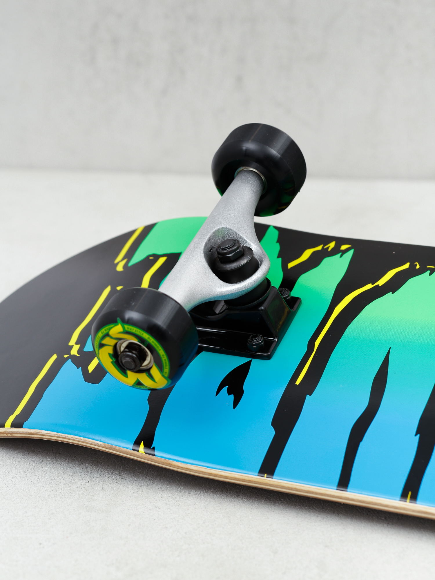 Deskorolka Creature Logo Offset Sk8 (black/blue/green)