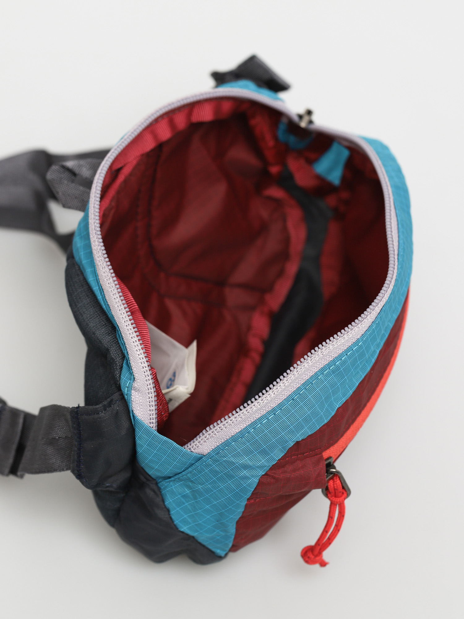 patagonia ultralight black hole mini hip pack roamer red Its tough design allows it to stow away into its own pocket when not in use Patagonia Ultralight Black Hole Mini