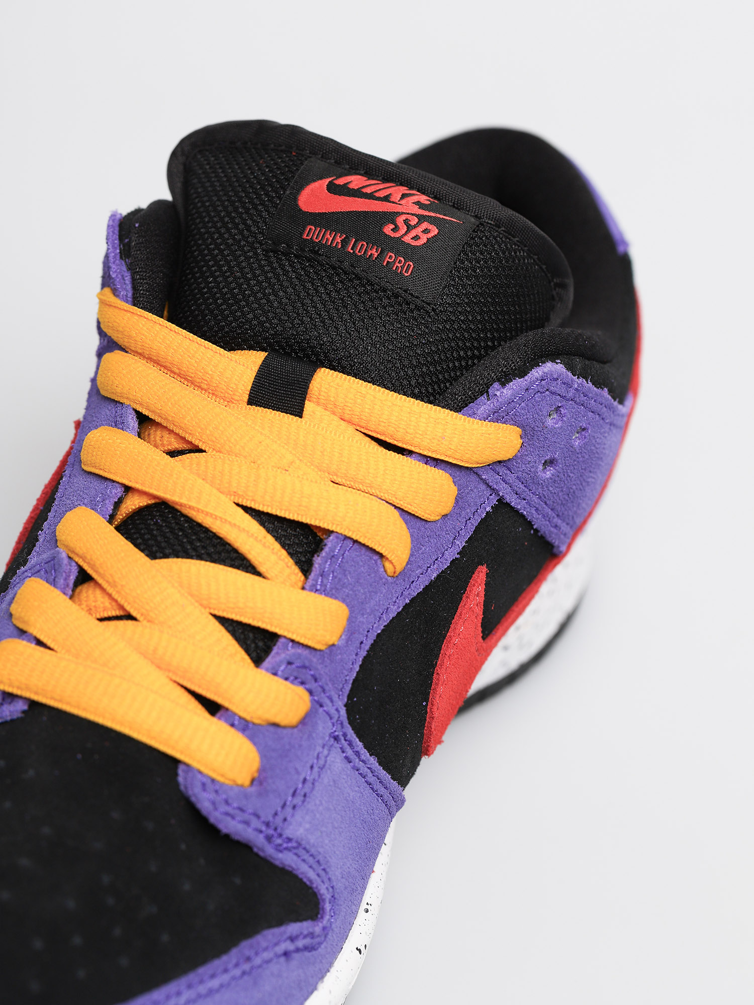 nike sb dunk low pro black sunburst varsity purple taxi