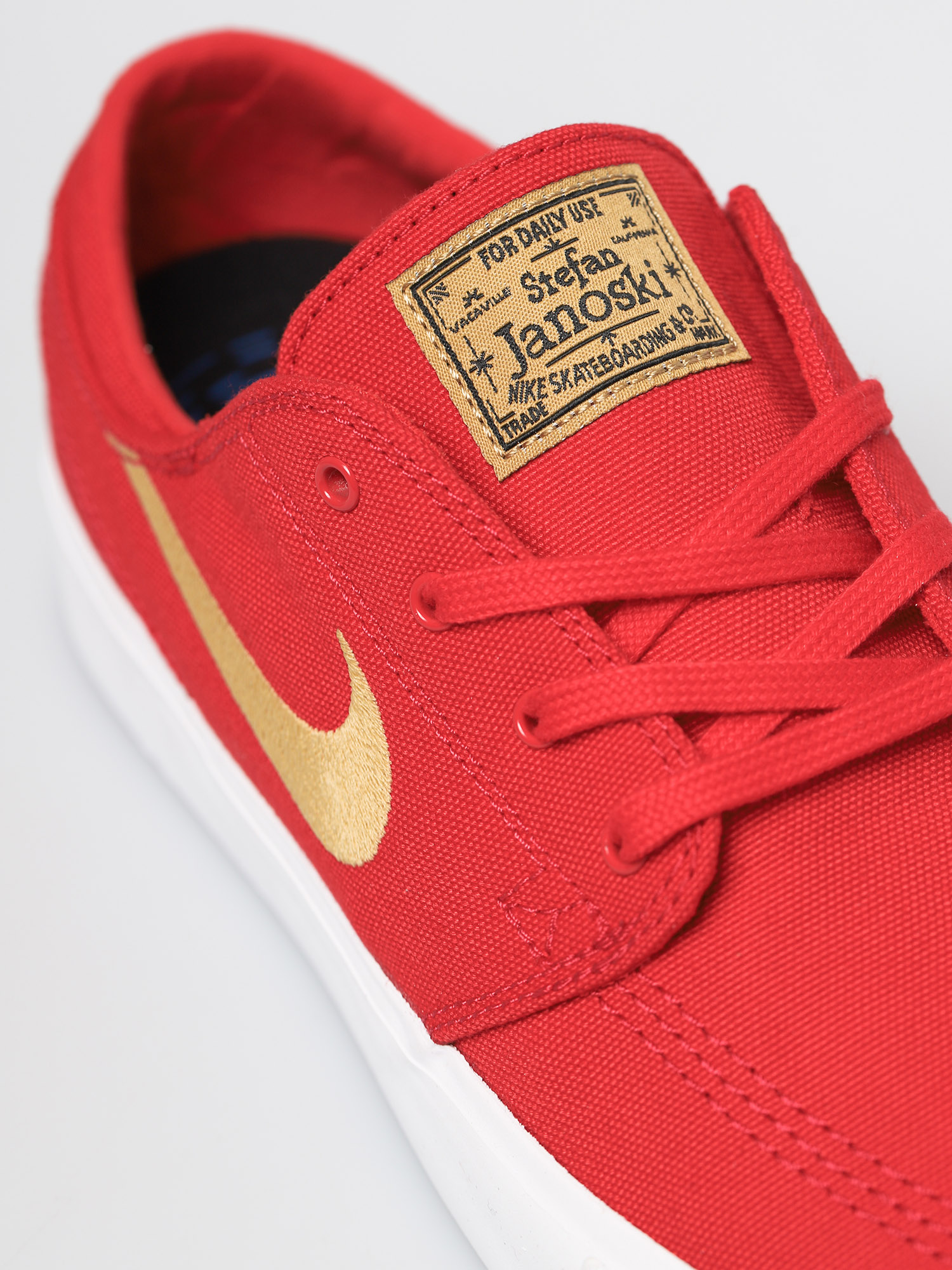 Buty Nike SB Zoom Janoski Canvas Rm (university red/club gold university red)