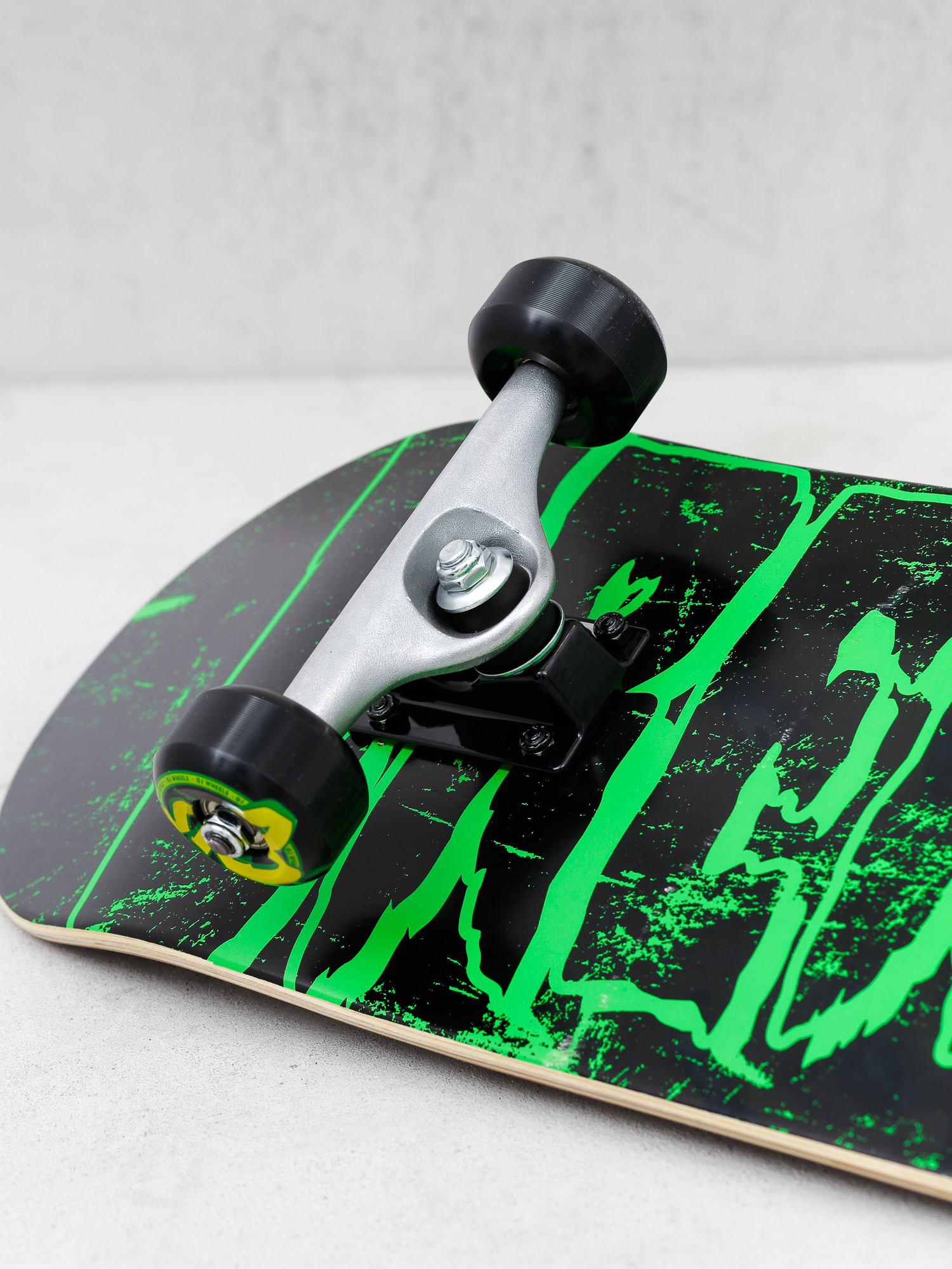 Deskorolka Creature Logo Erosion (black/green)