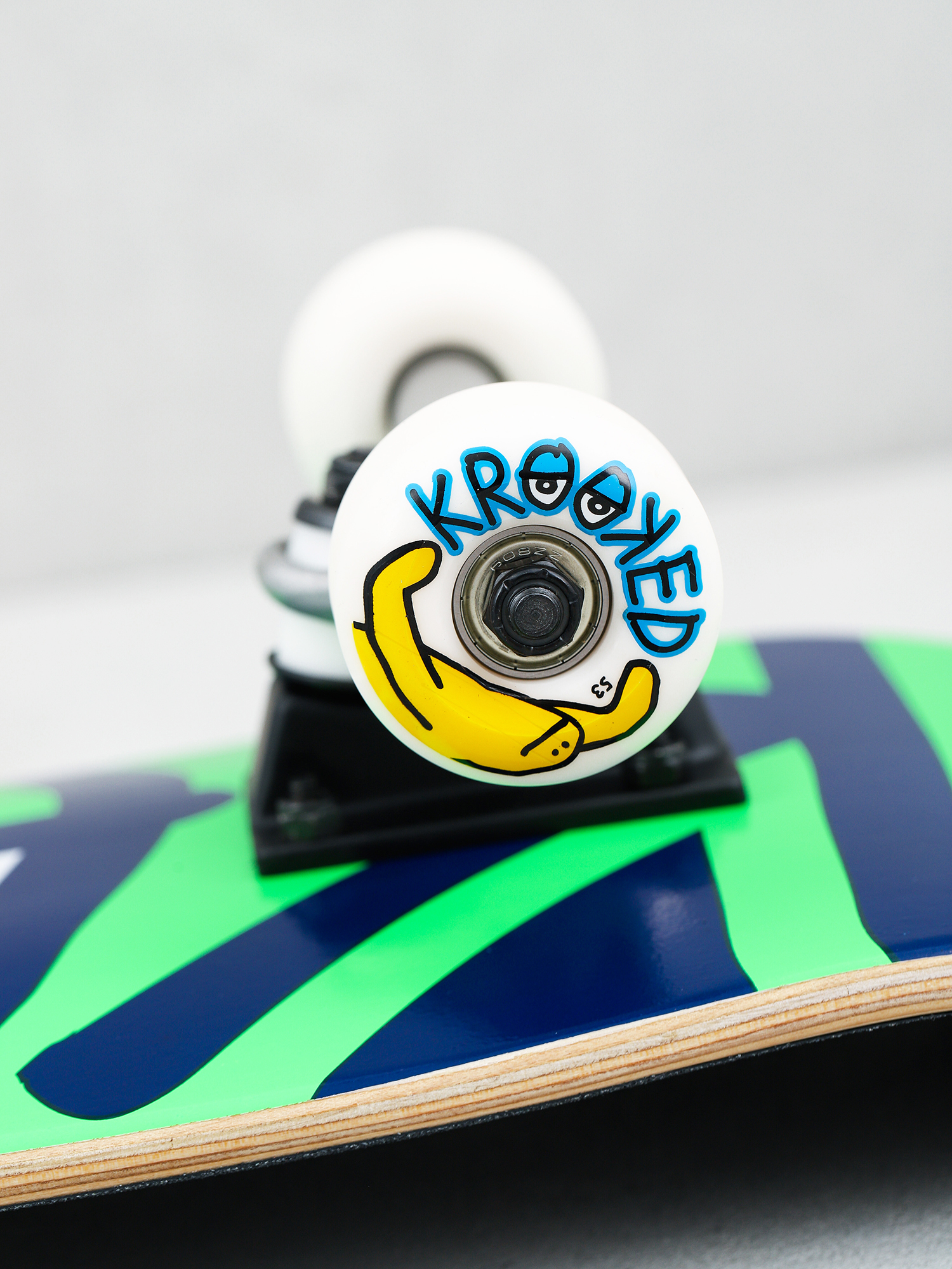 Deskorolka Krooked Bigger Eyes (green/navy)