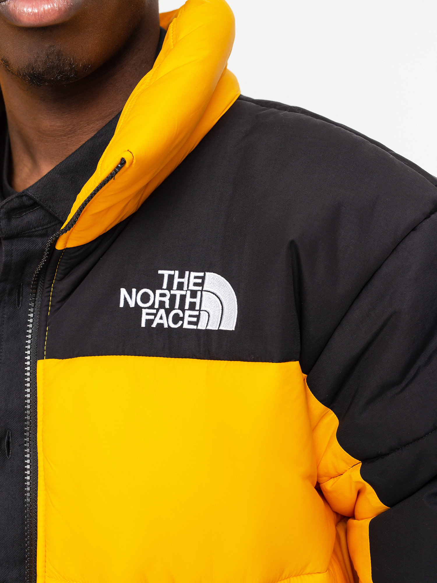 Kurtka The North Face Hmlyn Insulated (summit gold/black)