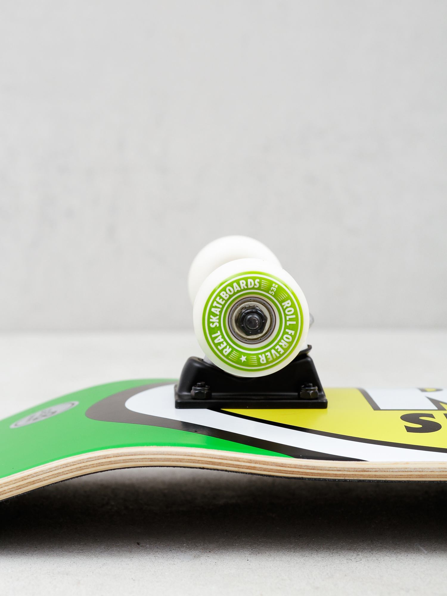 Deskorolka Real Tm Edition Oval (green/yellow/red)