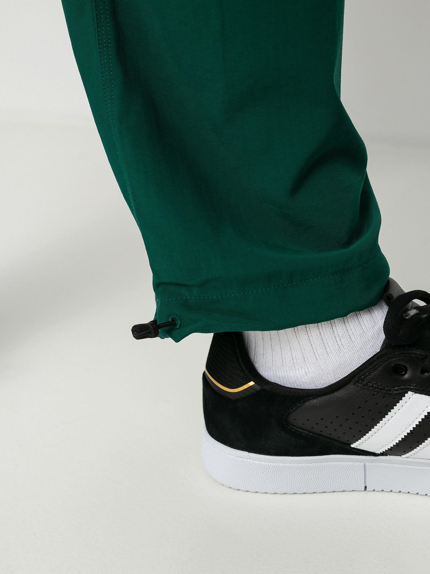Spodnie adidas Workshop (cgreen/black)