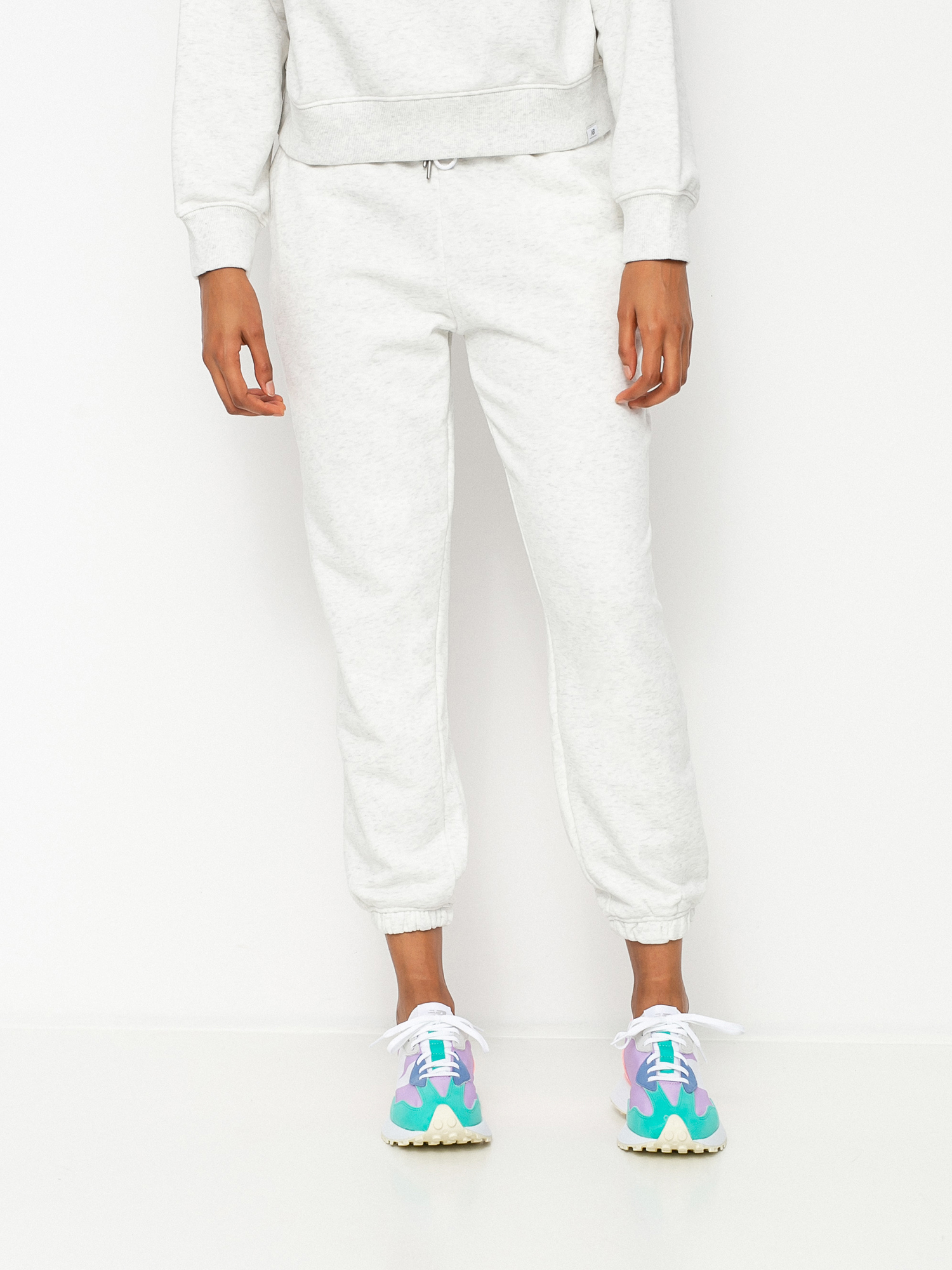Spodnie New Balance Athletics Intelligent Choice Wmn (sea salt heather)