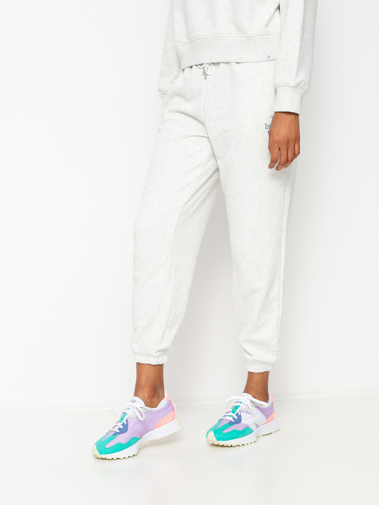 Spodnie New Balance Athletics Intelligent Choice Wmn (sea salt heather)