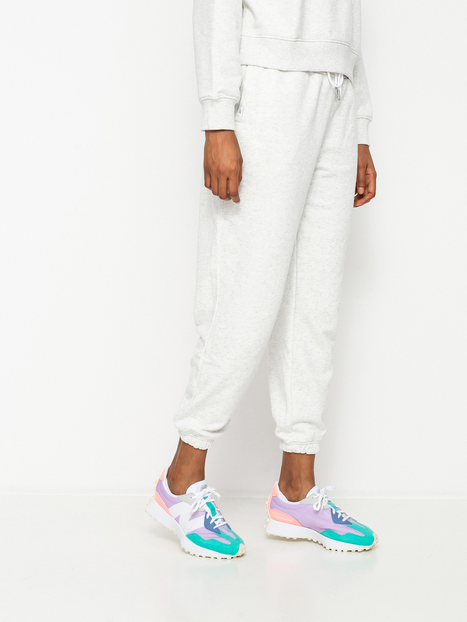 Spodnie New Balance Athletics Intelligent Choice Wmn (sea salt heather)