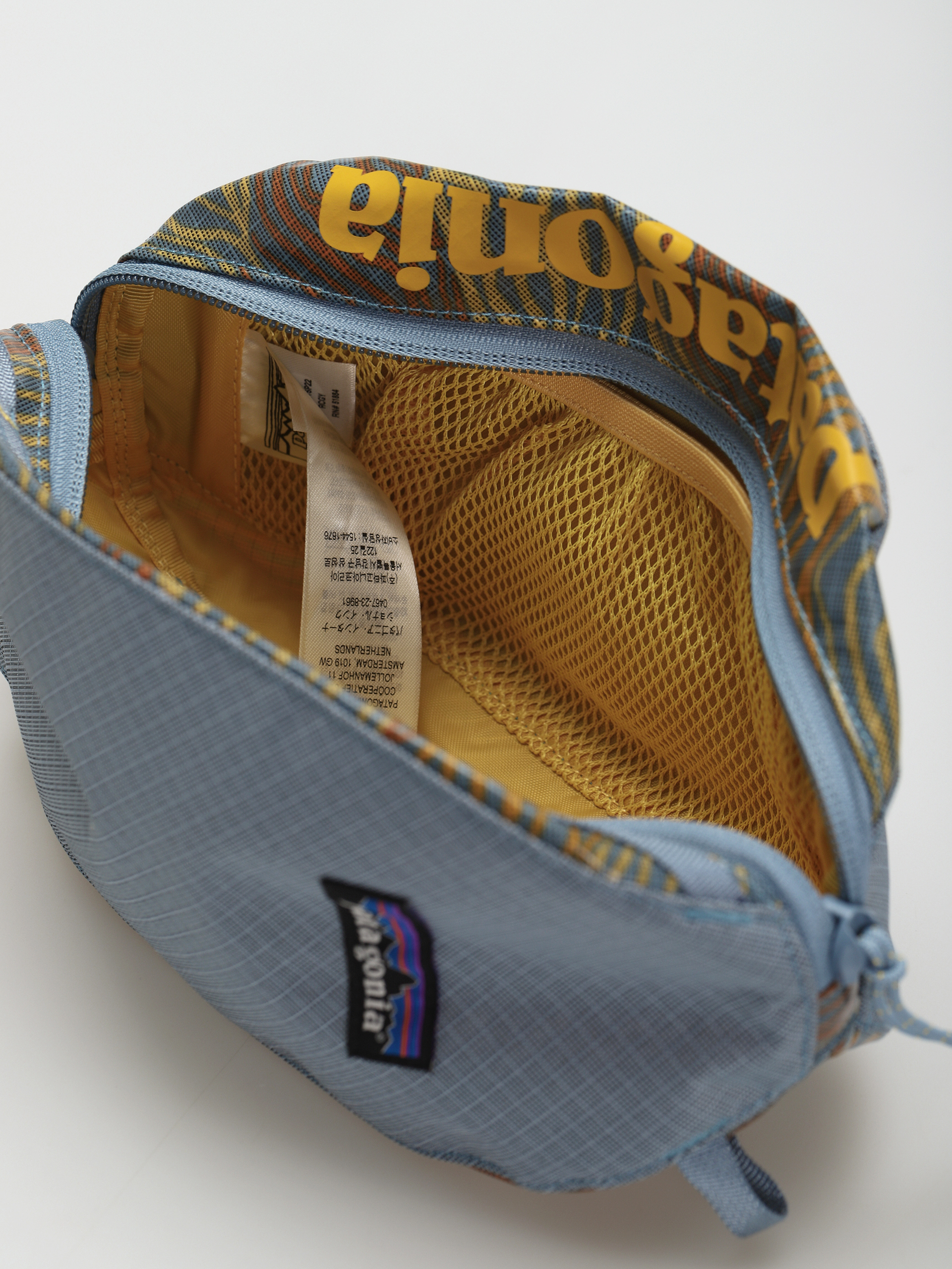 Kosmetyczka Patagonia Black Hole Cube Small (rock cycle multi big light plume grey)