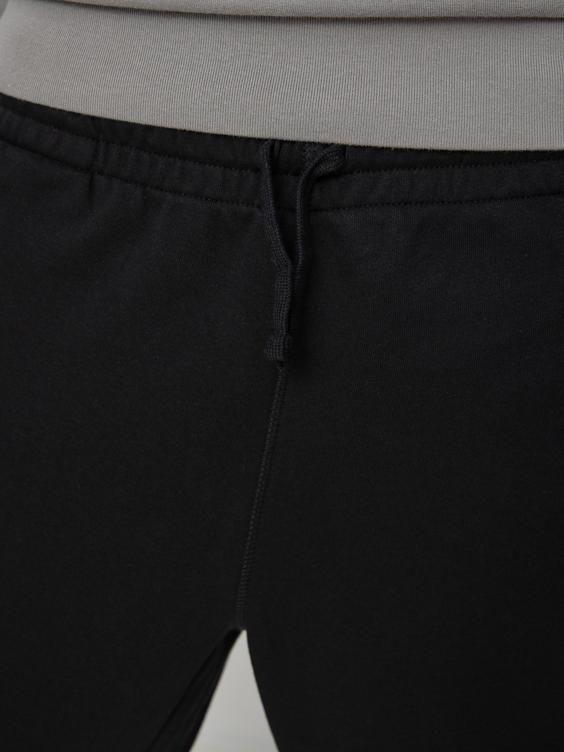 Spodnie New Balance Essentials Uni Ssentials (black)
