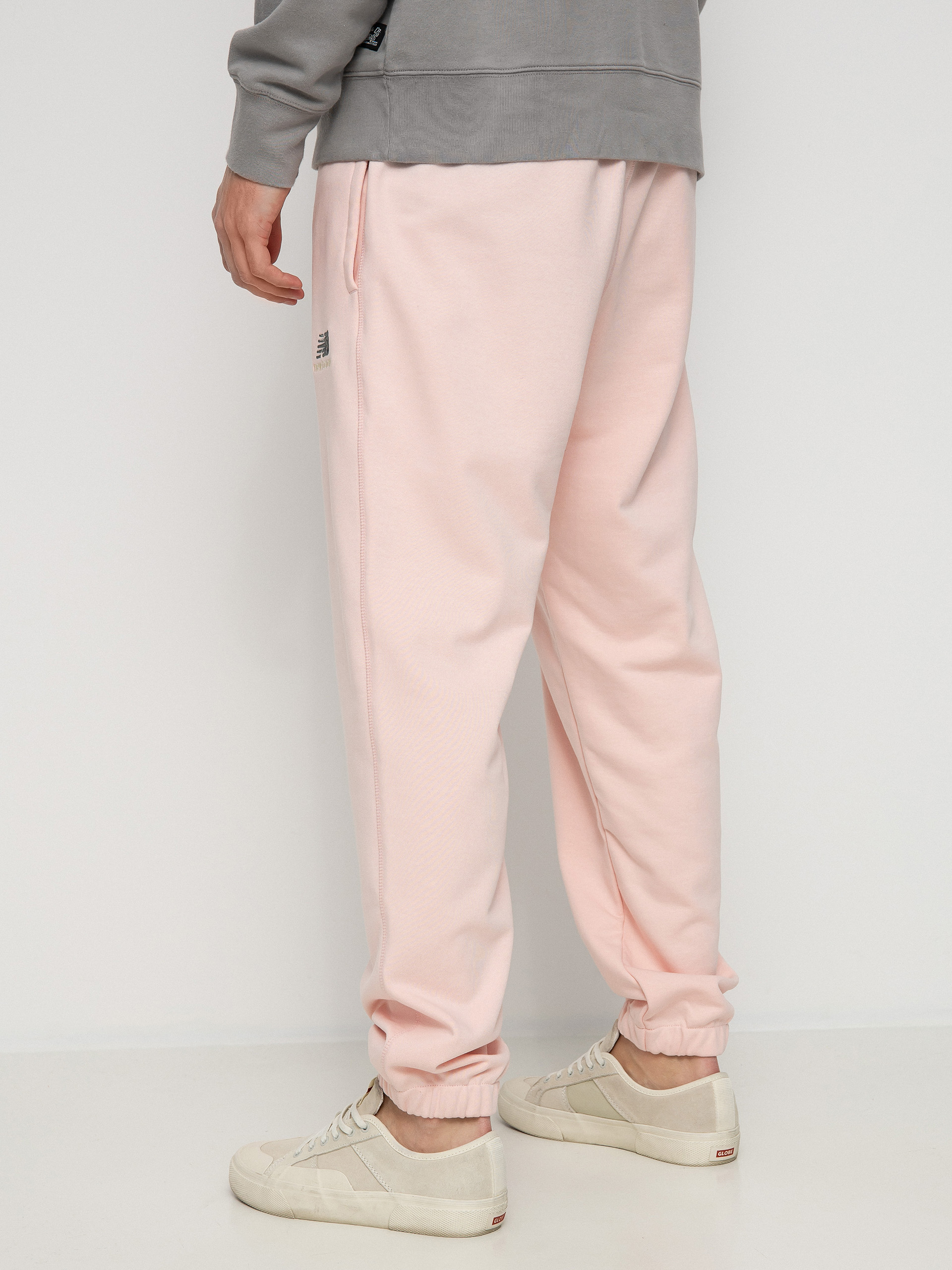 Spodnie New Balance Essentials Uni Ssentials (pink)