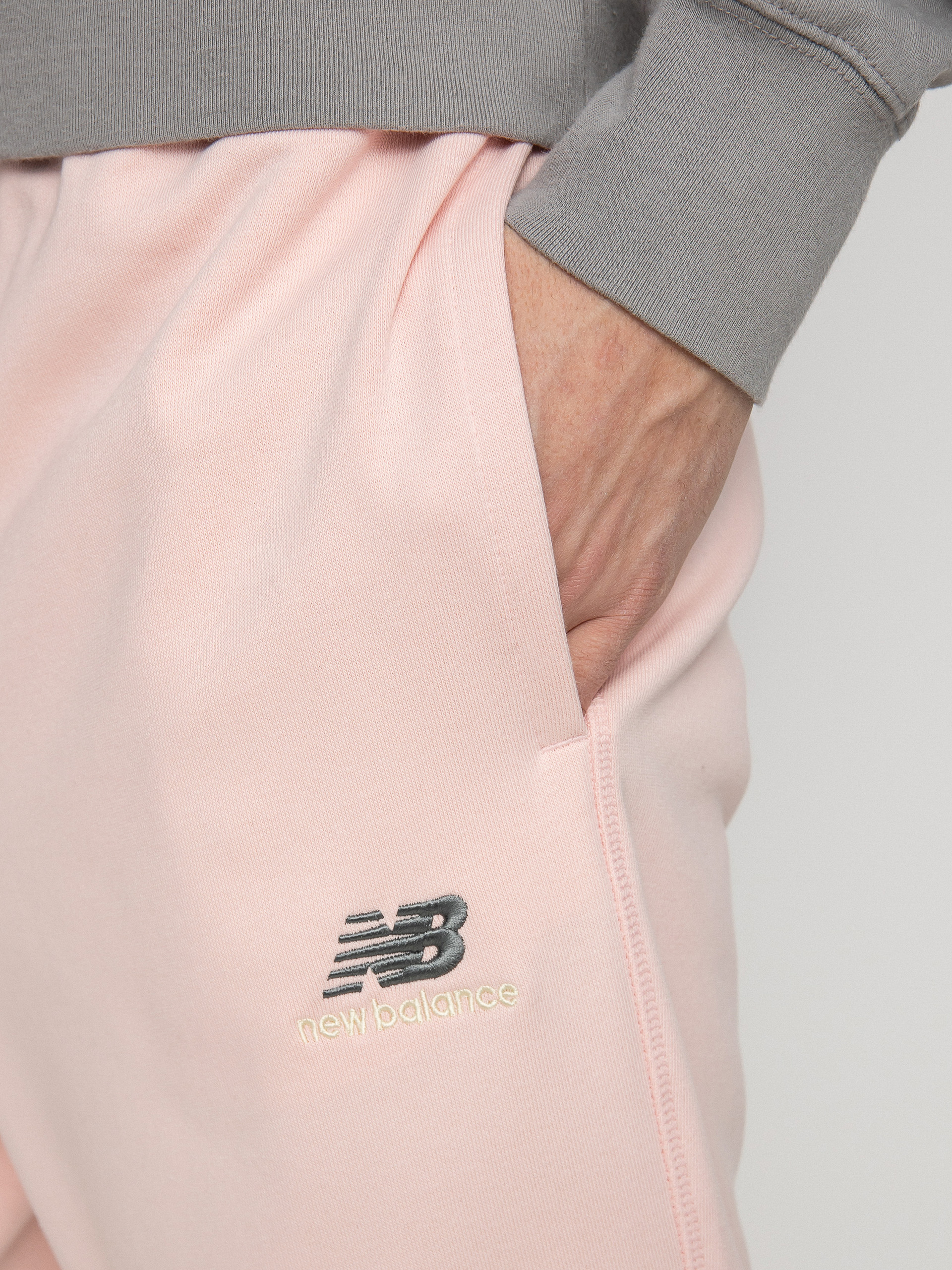 Spodnie New Balance Essentials Uni Ssentials (pink)
