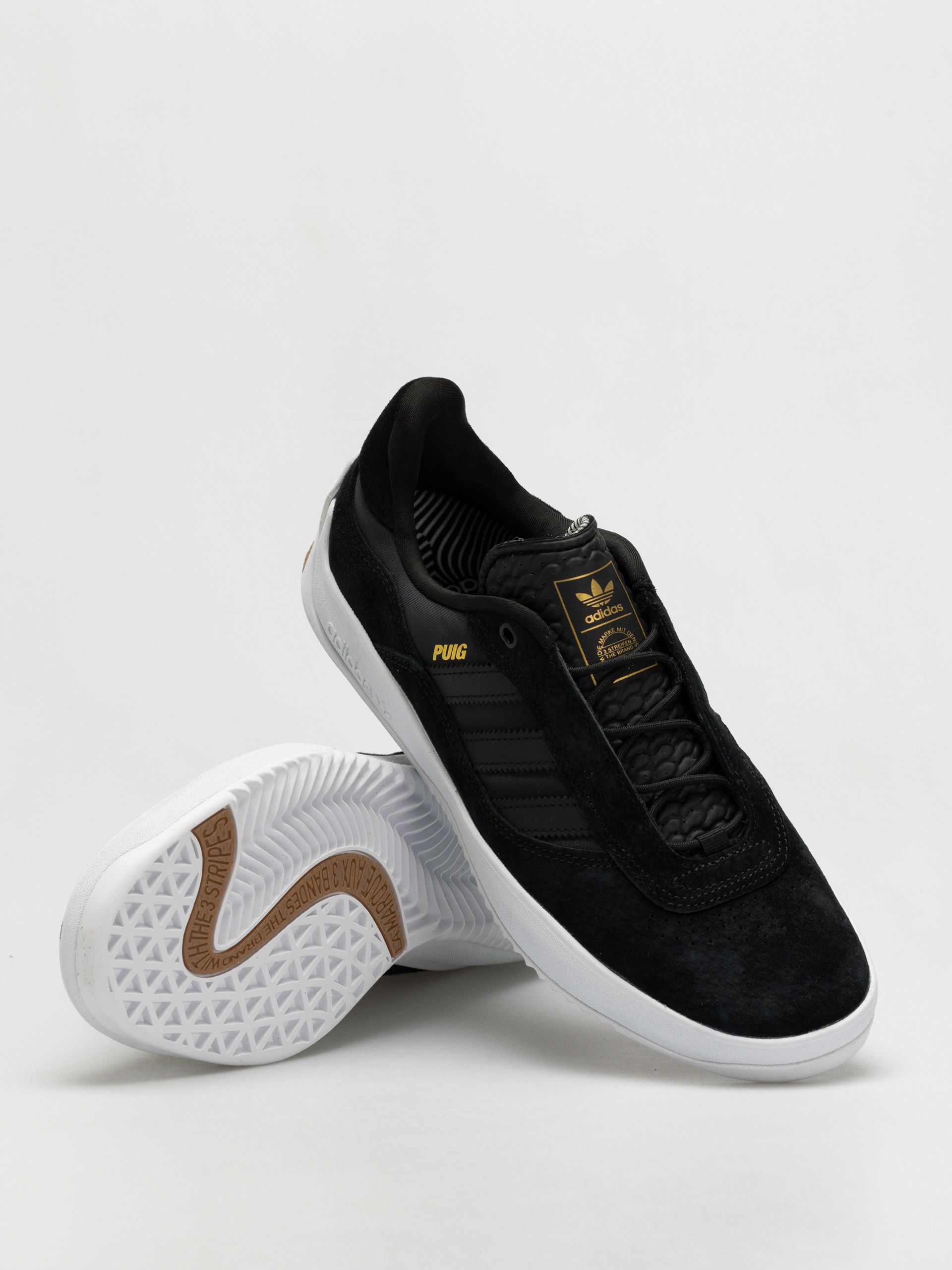 Buty adidas Puig (cblack/cblack/ftwwht)