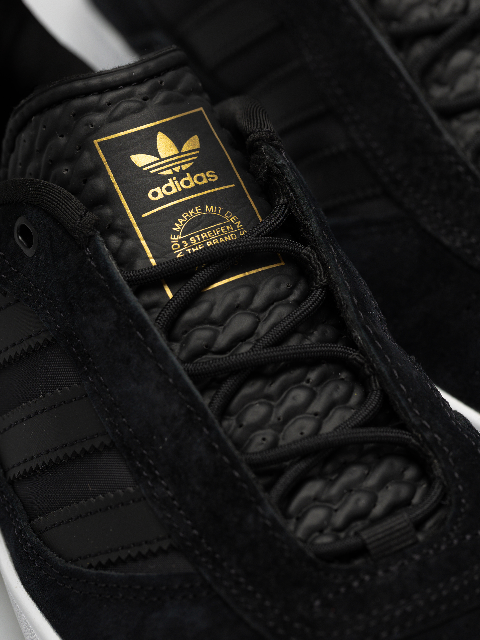 Buty adidas Puig (cblack/cblack/ftwwht)