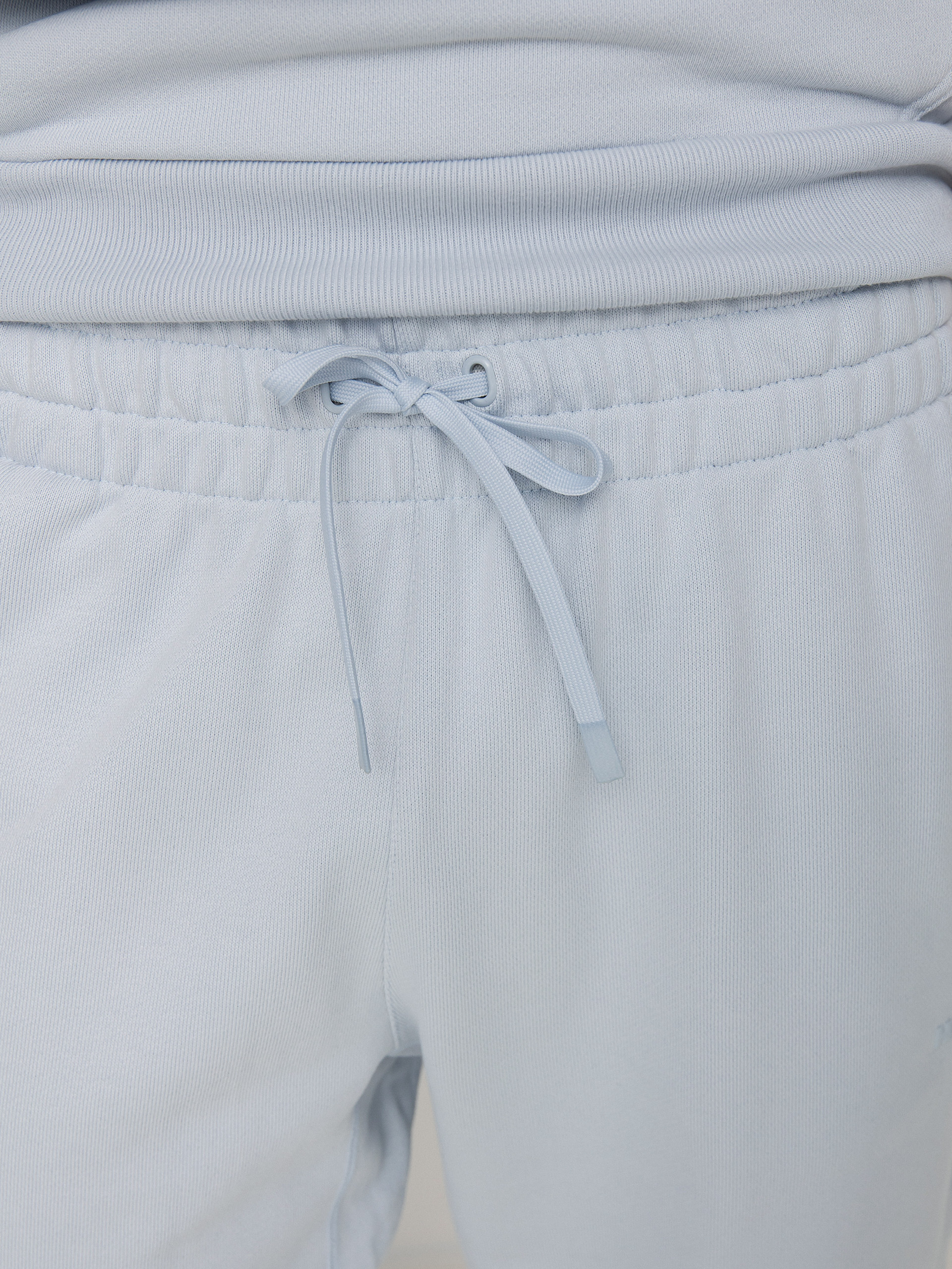 Spodnie adidas Originals Pharrell Williams Basics (halblu)