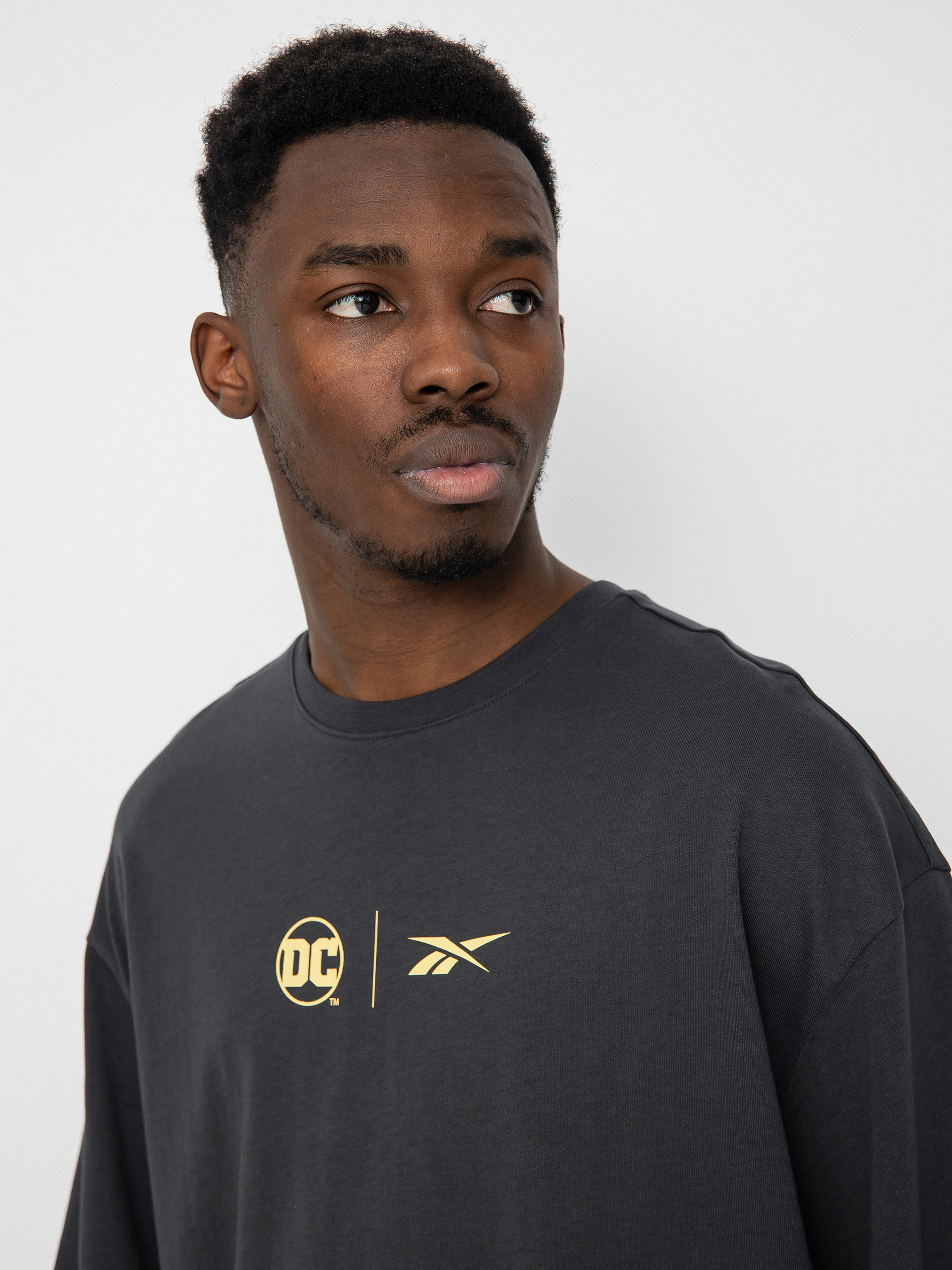 T-shirt Reebok X DC B Vs J (purgry)