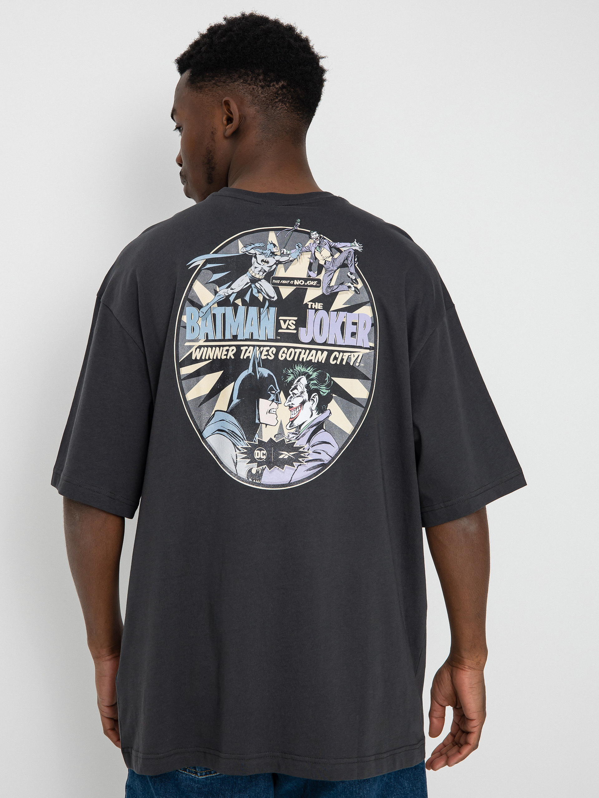 T-shirt Reebok X DC B Vs J (purgry)