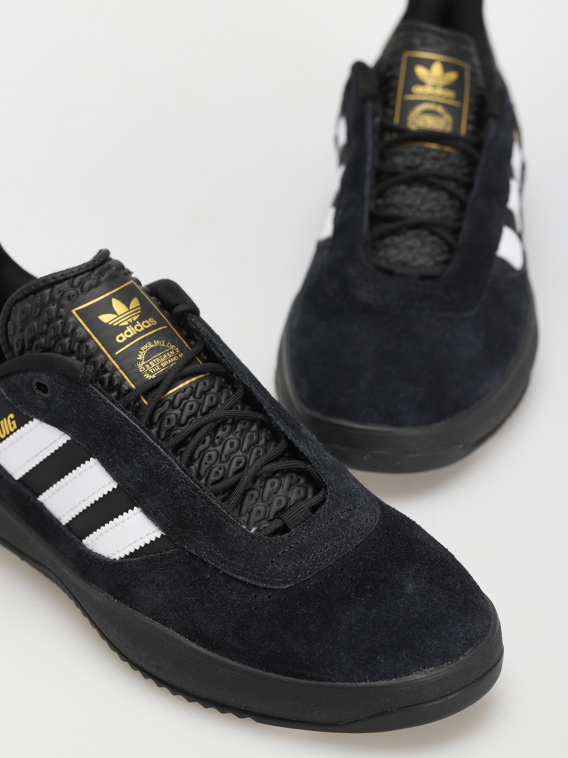 Buty adidas Puig (cblack/ftwwht/goldmt)