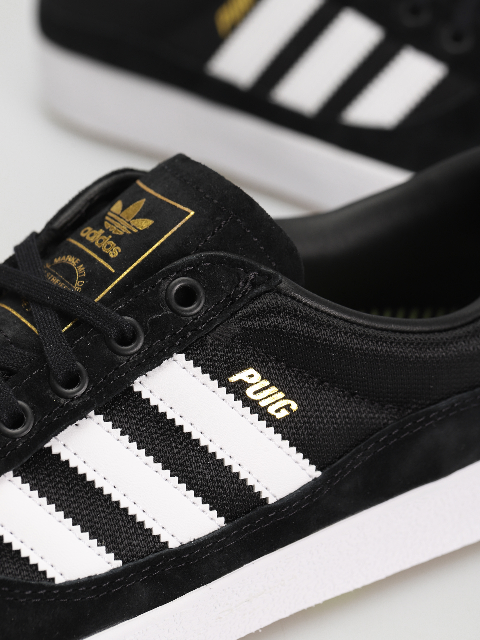 Buty adidas Puig Indoor (cblack/ftwwht/pullim)