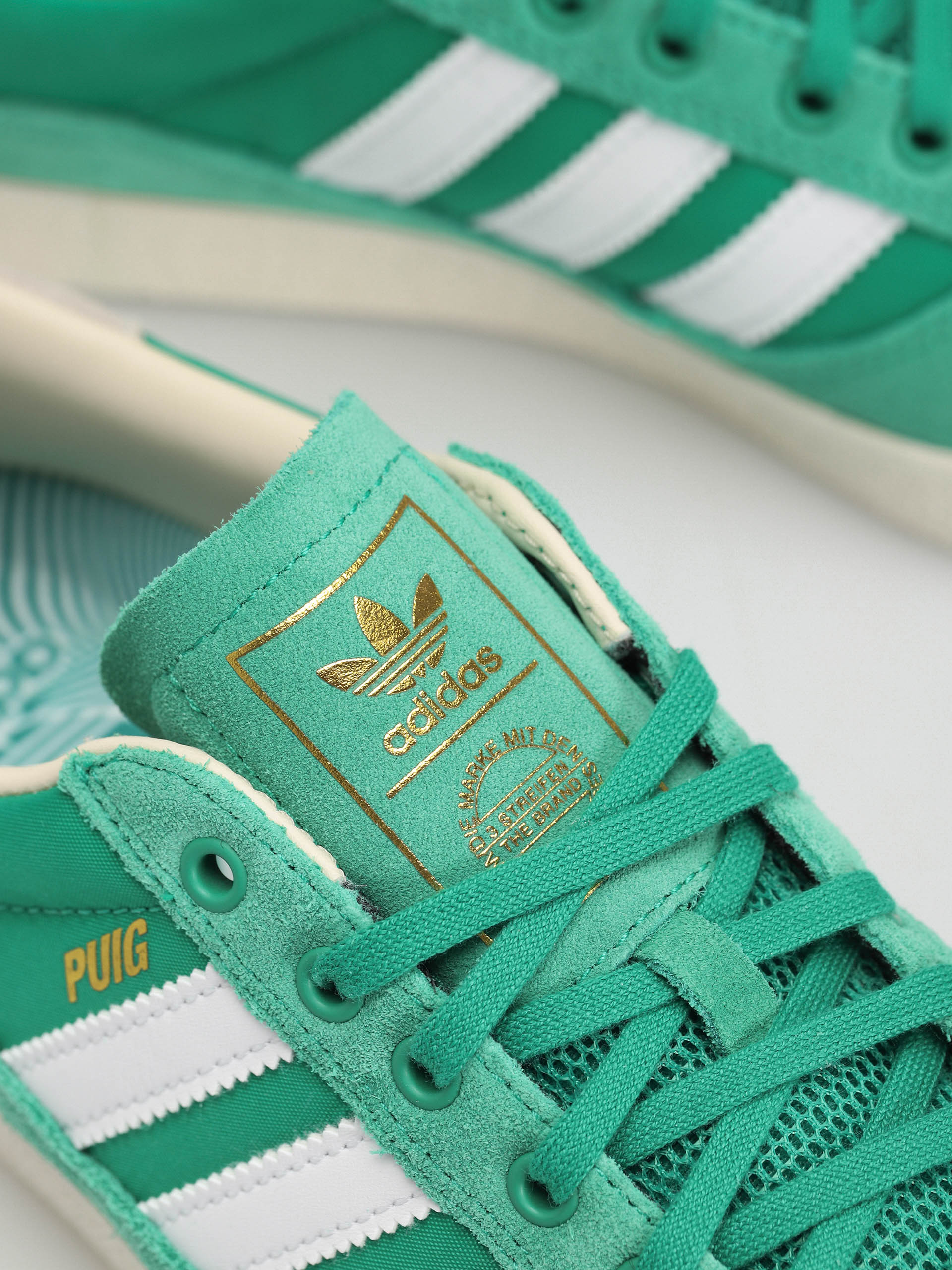 Buty adidas Puig Indoor (cougrn/ftwwht/cwhite)