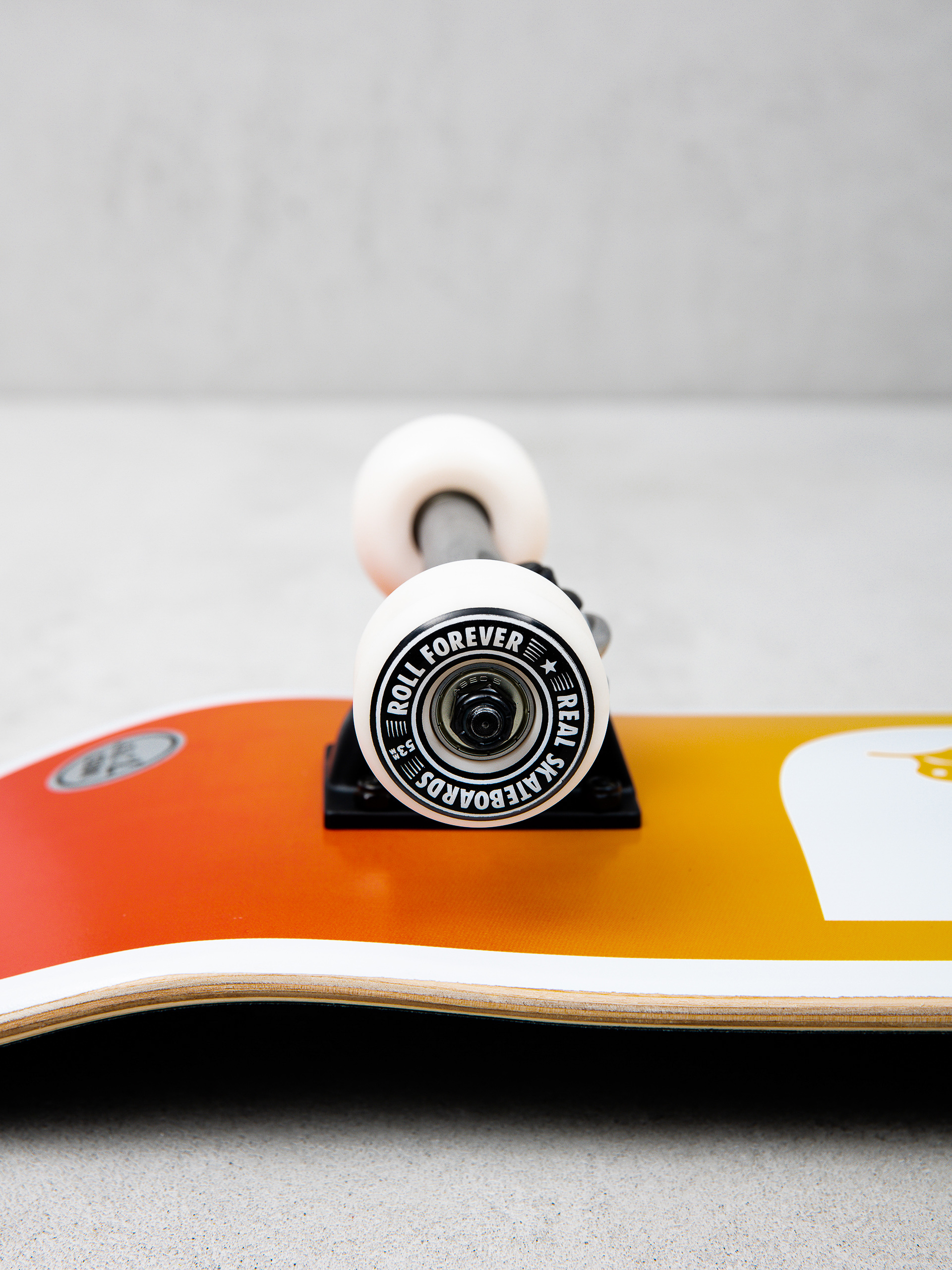 Deskorolka Real Be Free Fade (orange/yellow/green)