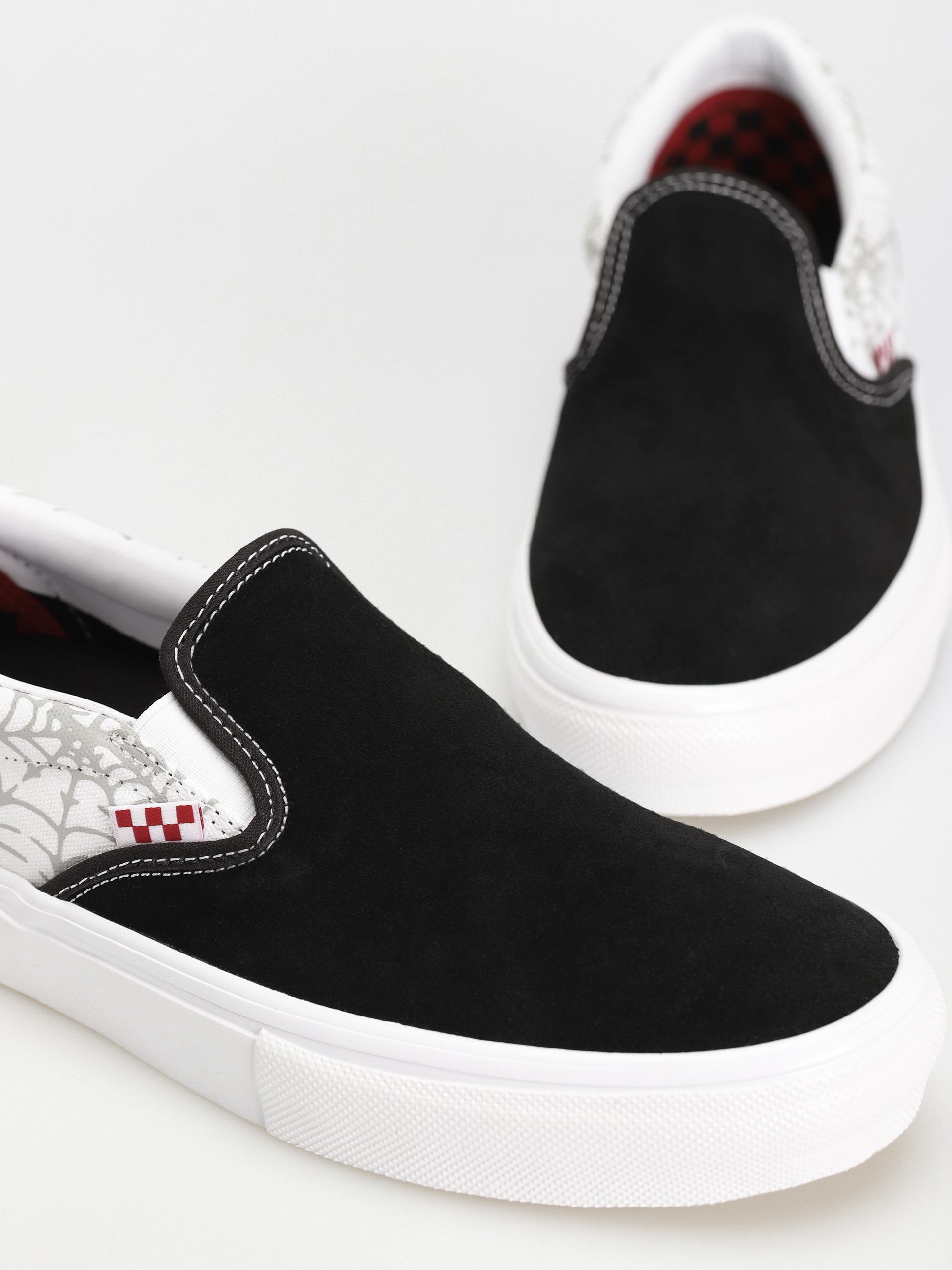 Buty Vans Skate Slip On (black widow spider black/white/red)