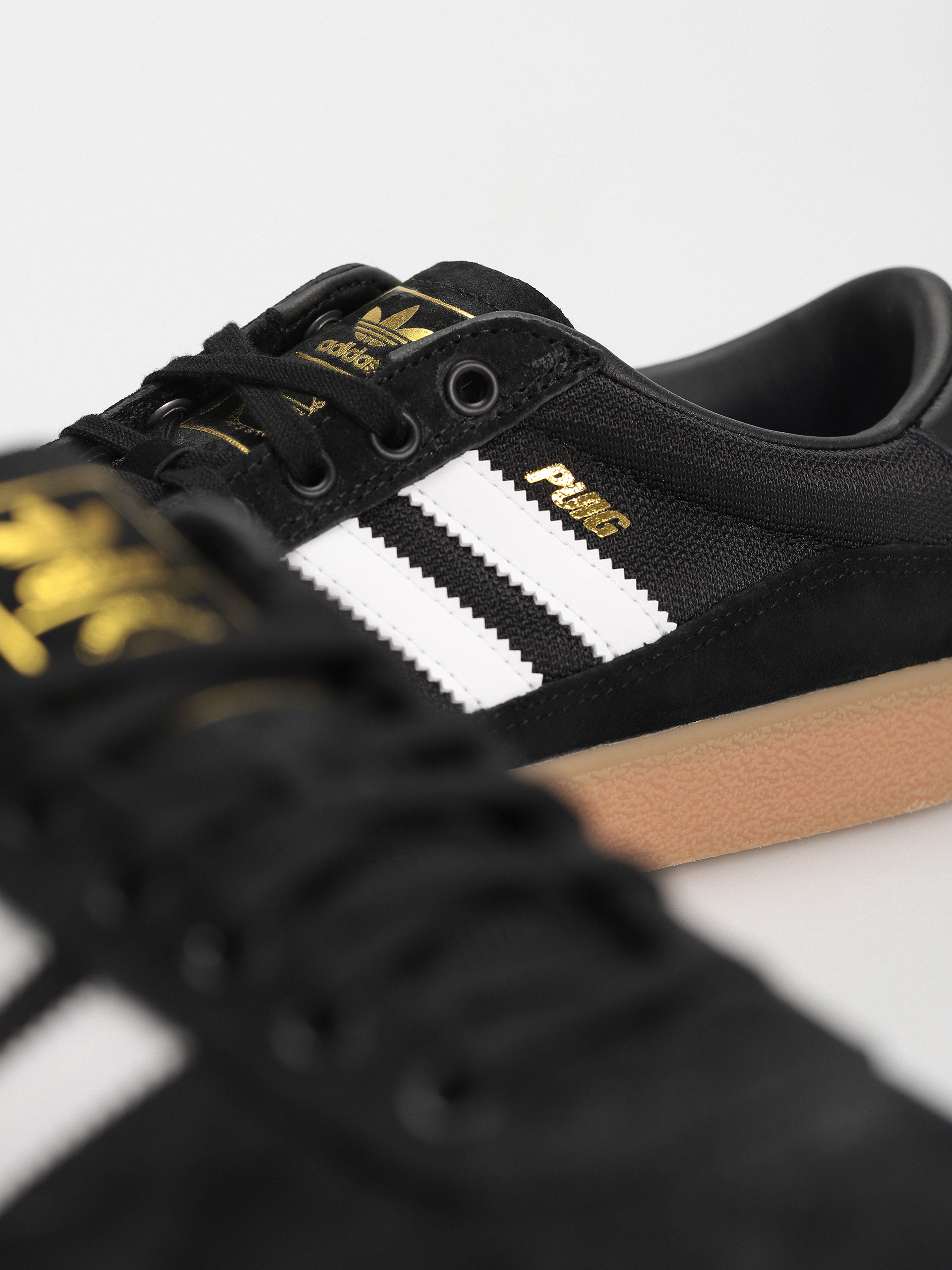 Buty adidas Puig Indoor (cblack/ftwwht/gum4)