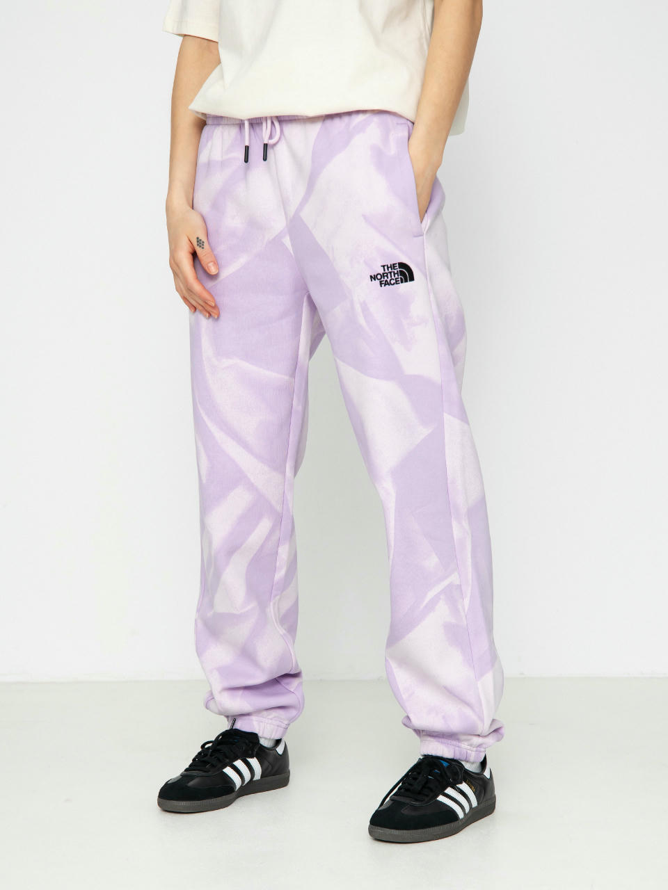 Spodnie The North Face Essential Jogger Print Wmn (icy lilac garment fold)