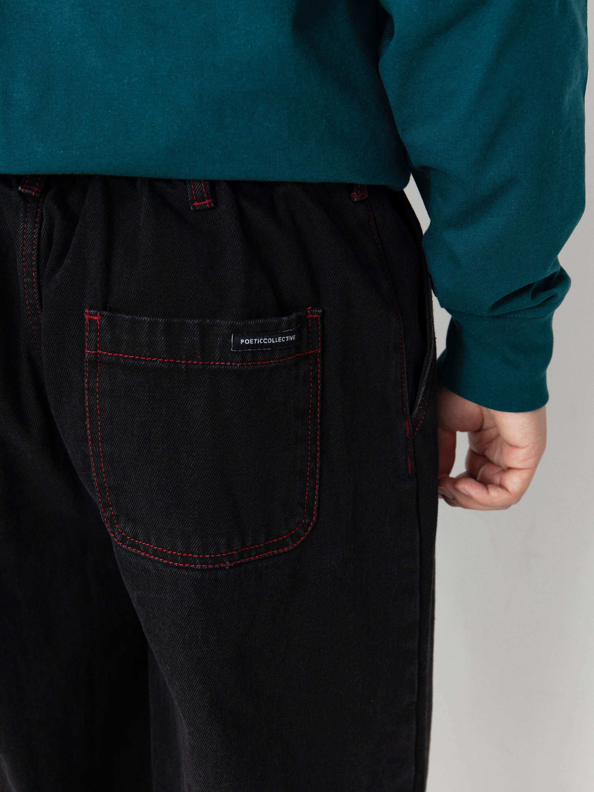 Spodnie Poetic Collective Sculptor (black denim w red stitching)