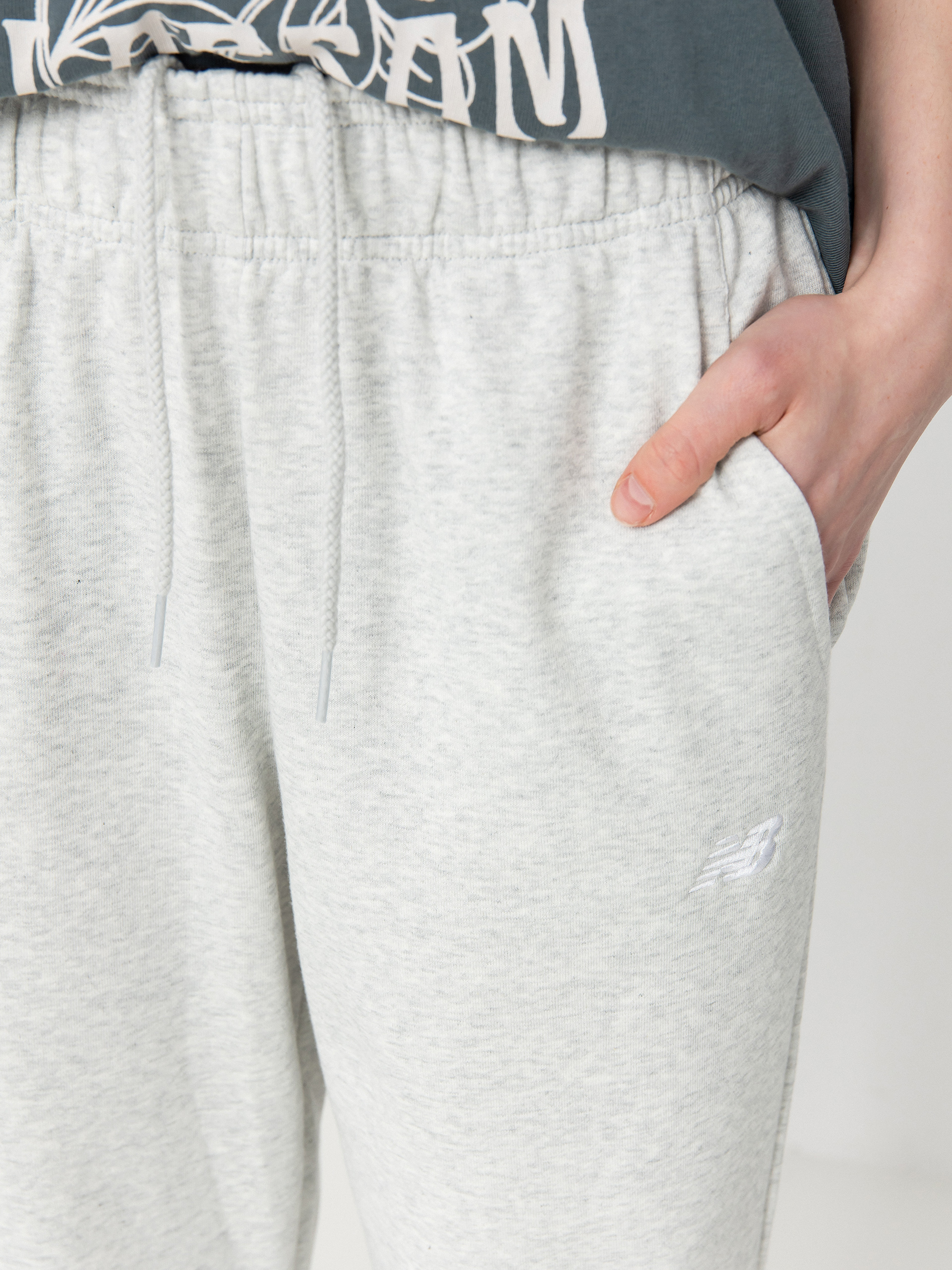 Spodnie New Balance French Terry Wmn (ashheath)