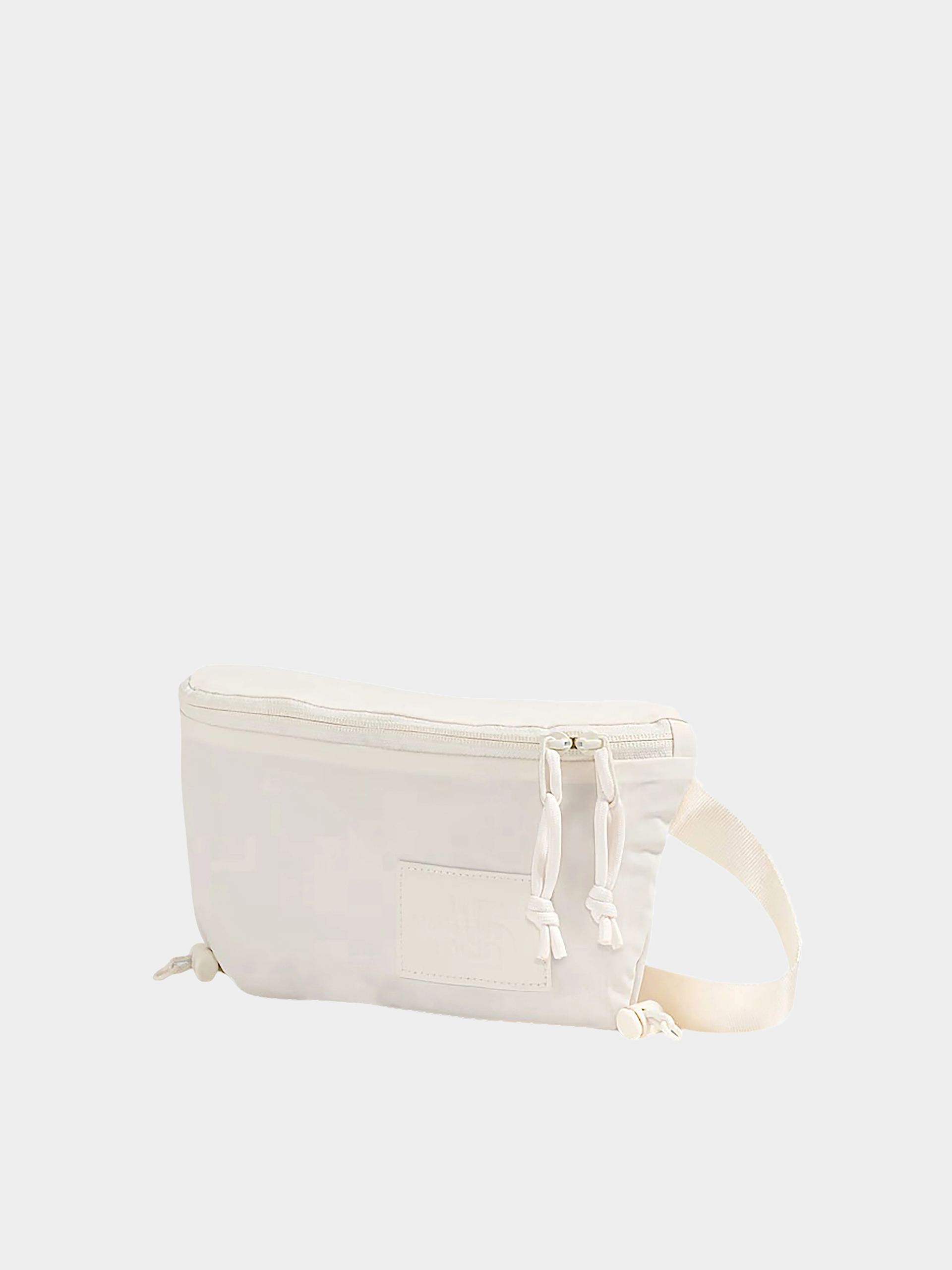 Nerka The North Face Never Stop Lumbar Wmn (white dune)