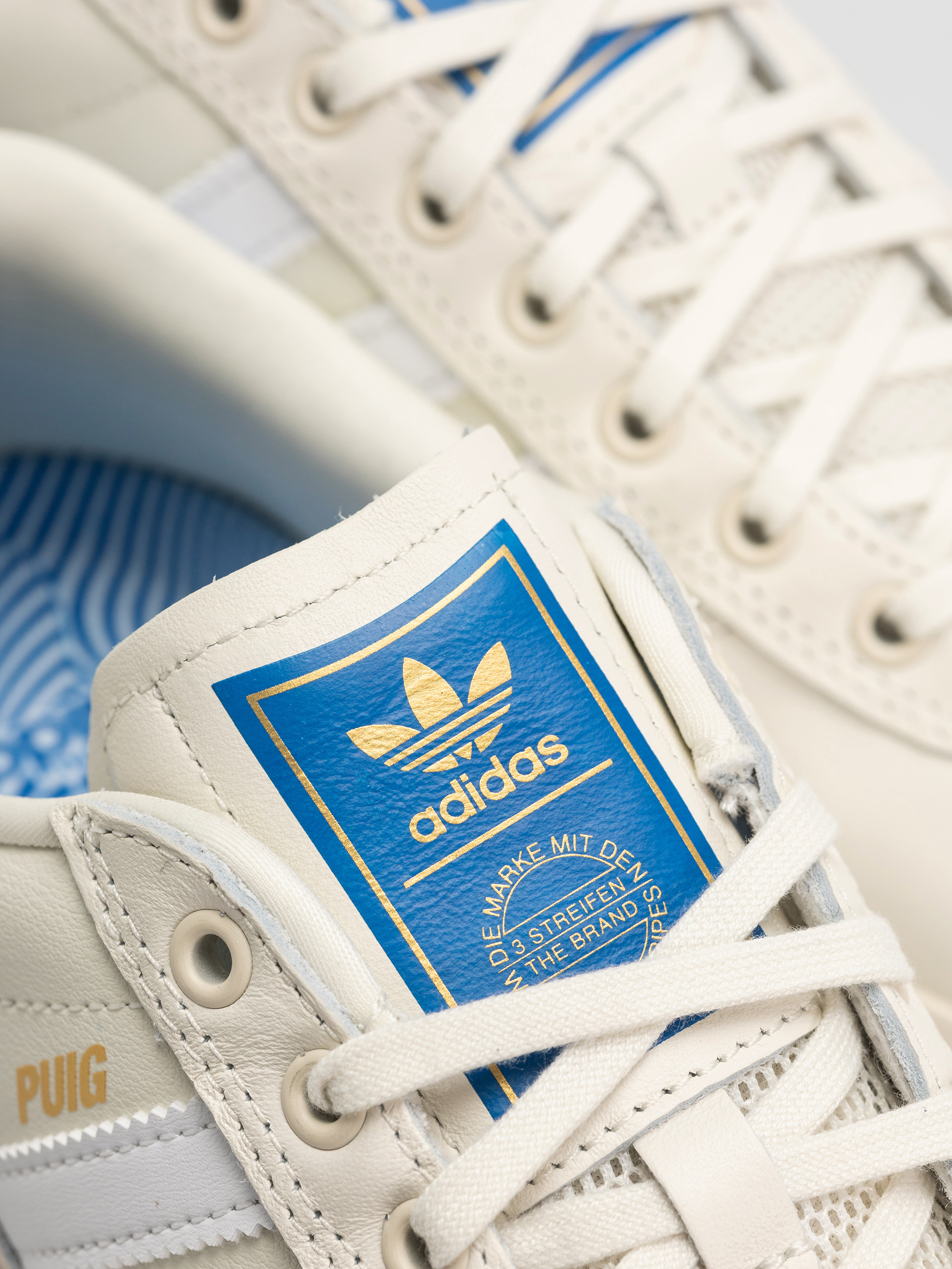 Buty adidas Puig Indoor (owhite/ftwwht/blubir)
