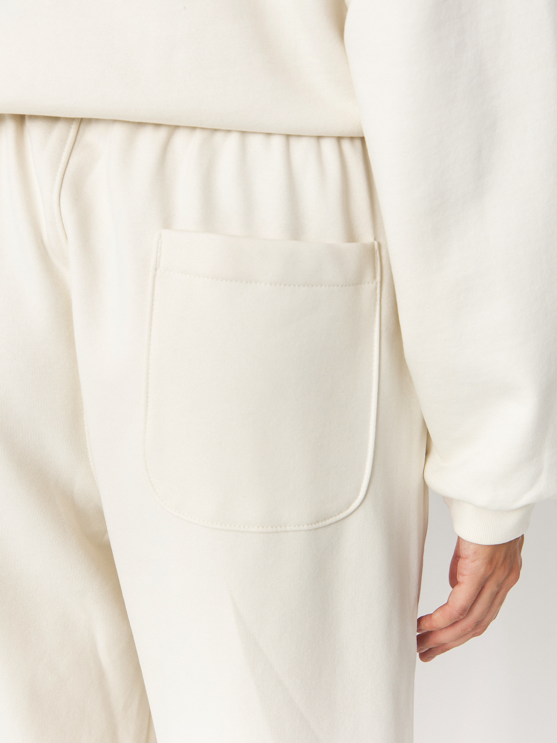 Spodnie The North Face Red Box (white dune)