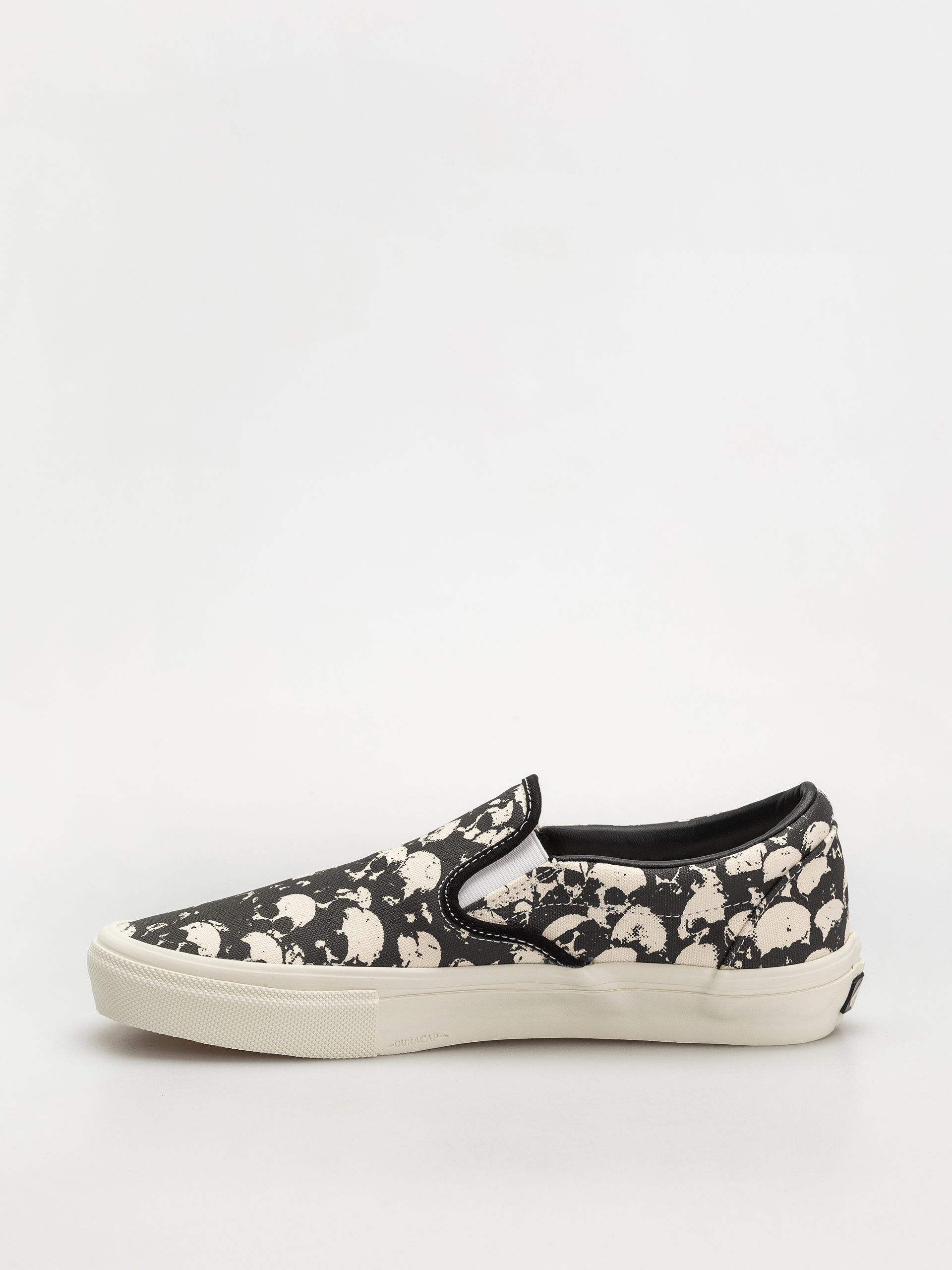 Buty Vans Skate Slip On (skull pile black/white/gum)