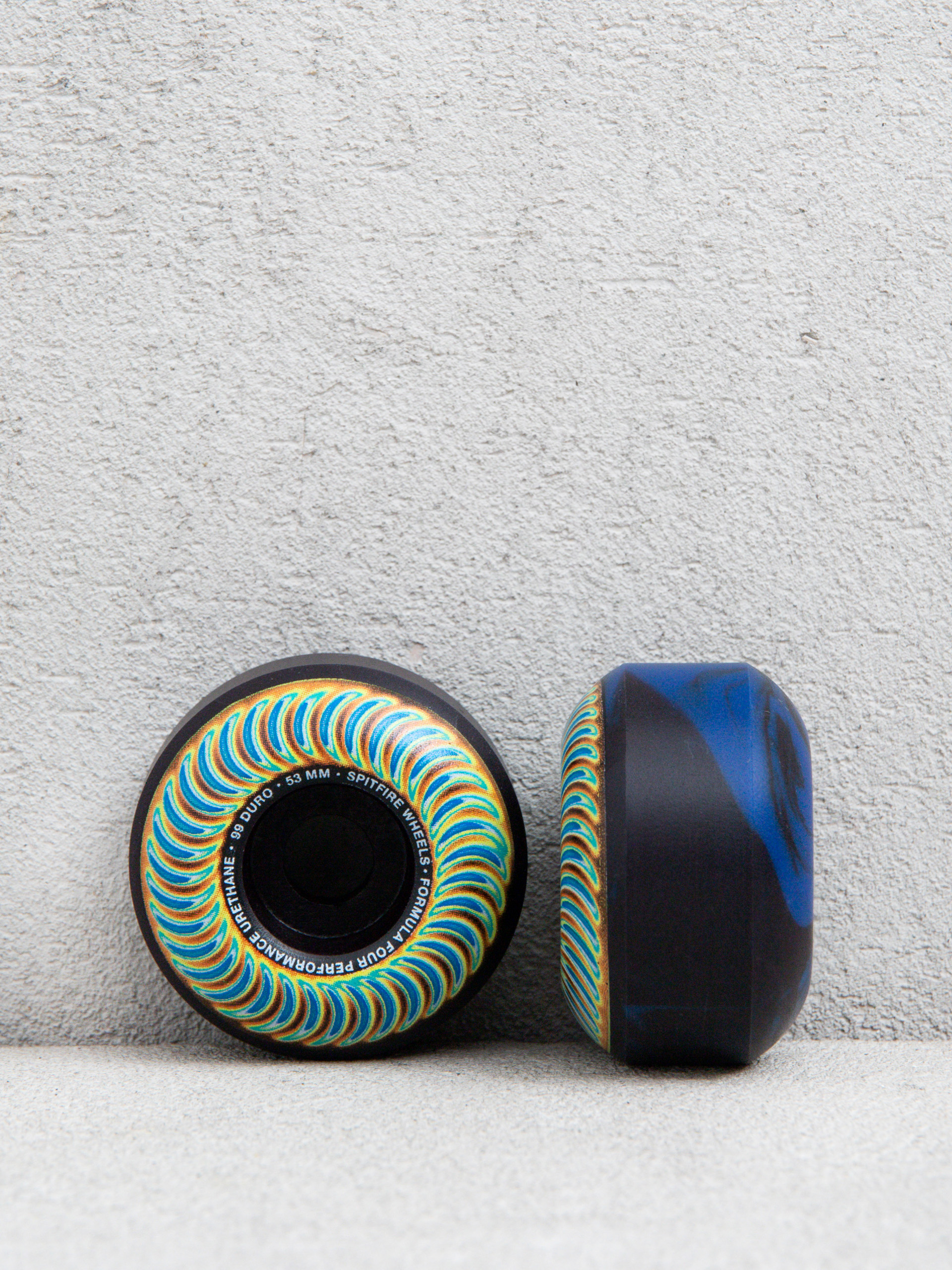 Kółka Spitfire F4 99D Radioactive Classic (black/blue swirl)
