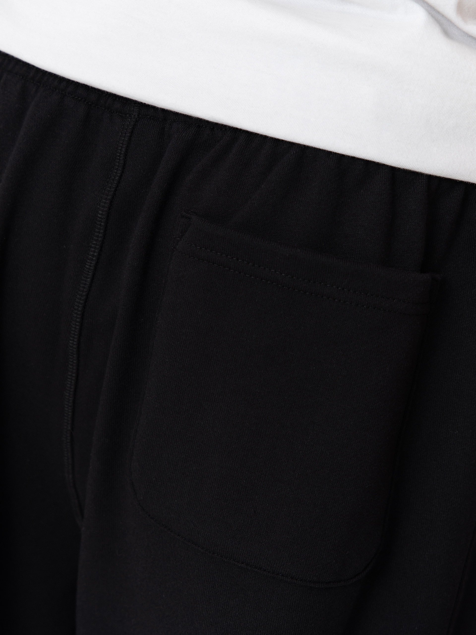 Spodnie New Balance Athletics French Terry (black)