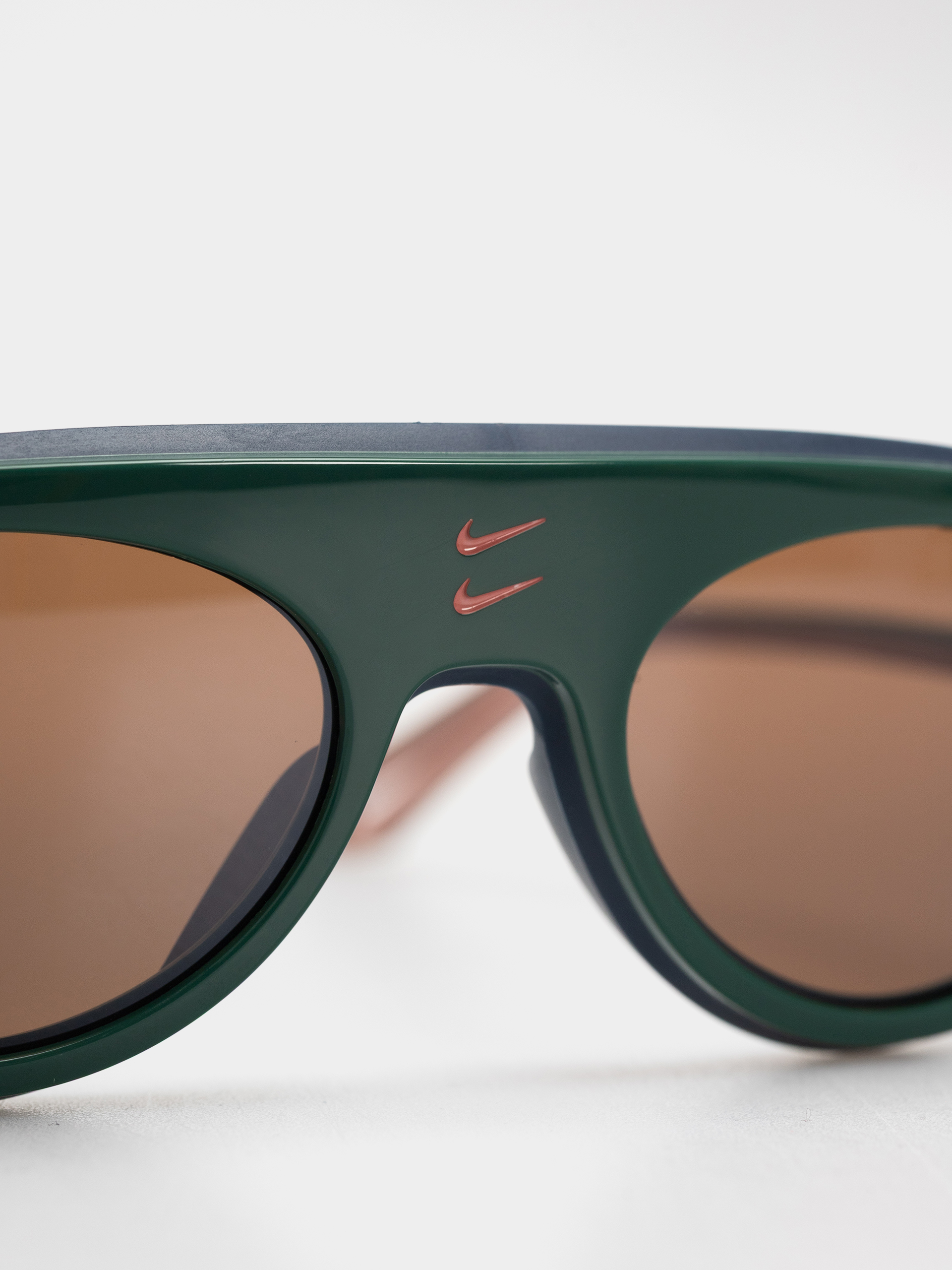 Okulary przeciwsłoneczne Nike Forge Envy (fir/mauve)