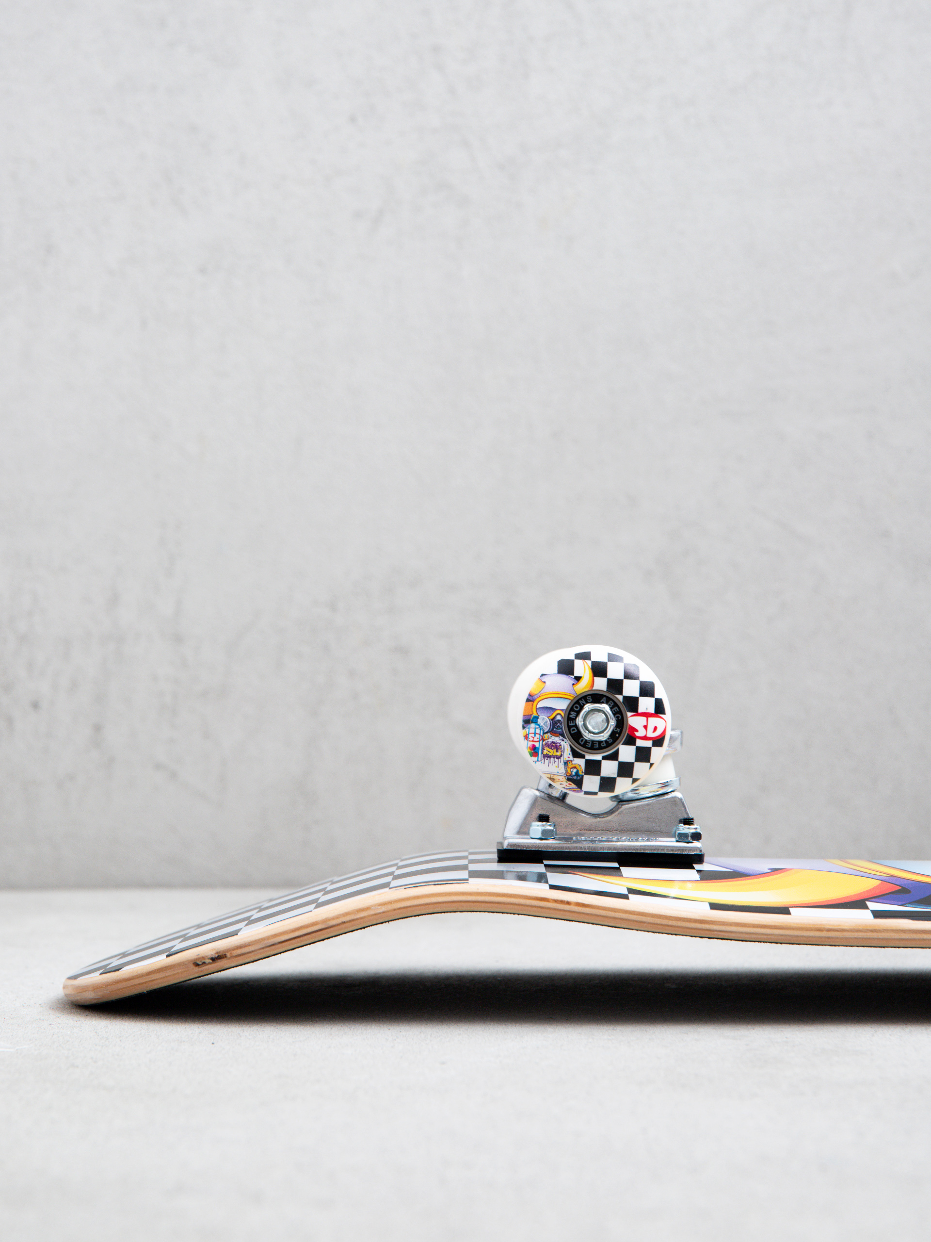 Deskorolka Speed Demons Tagger (black/white checks)