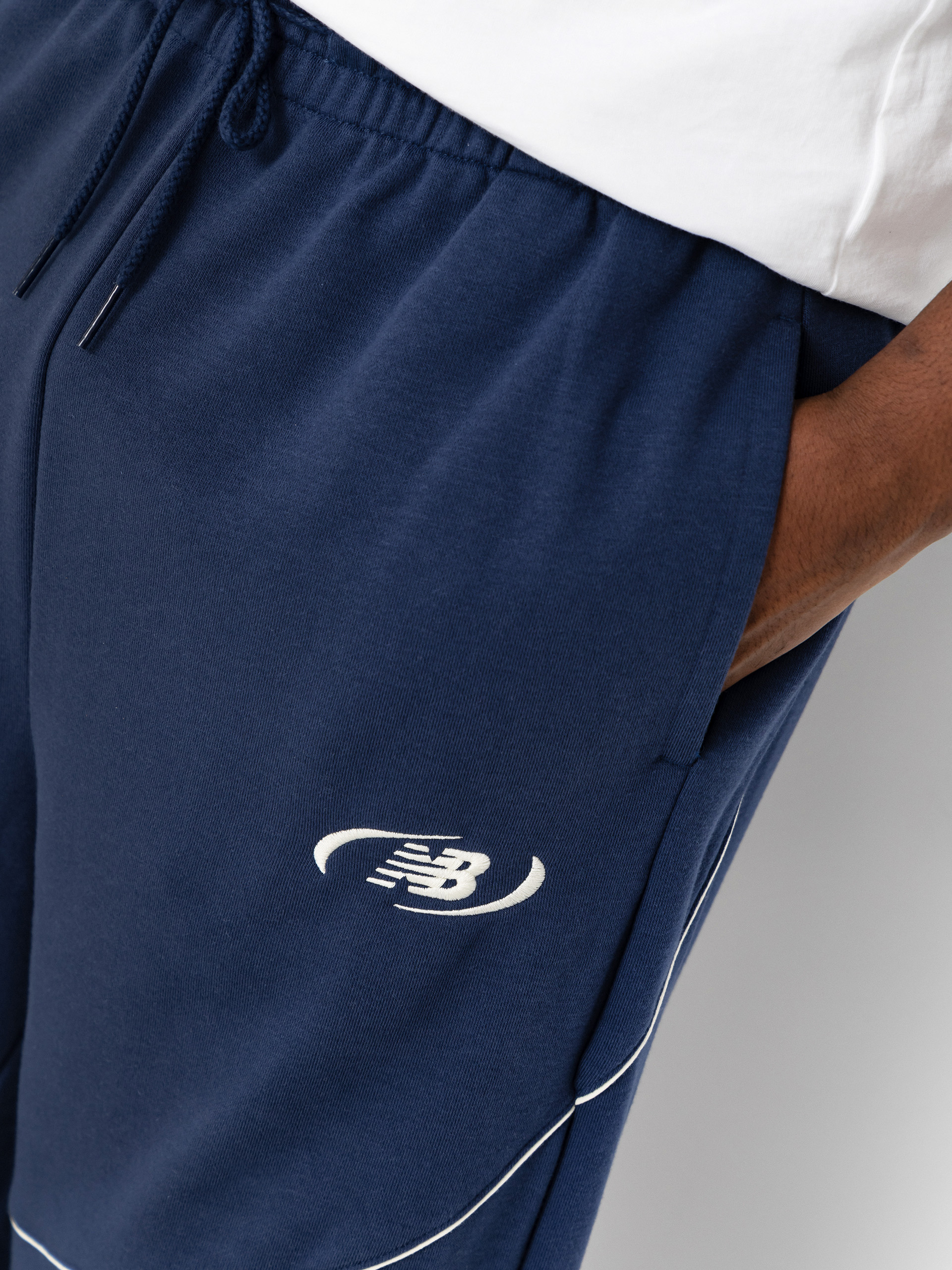 Spodnie New Balance Trackside French Terry (navy)