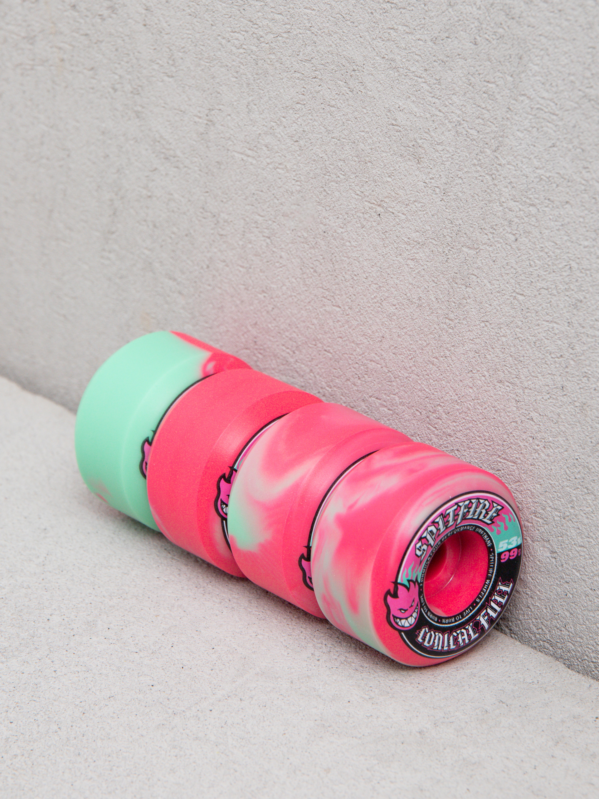 Kółka Spitfire F4 99D Team Color Pack F4 99 Conical Full (teal/pink swirl)
