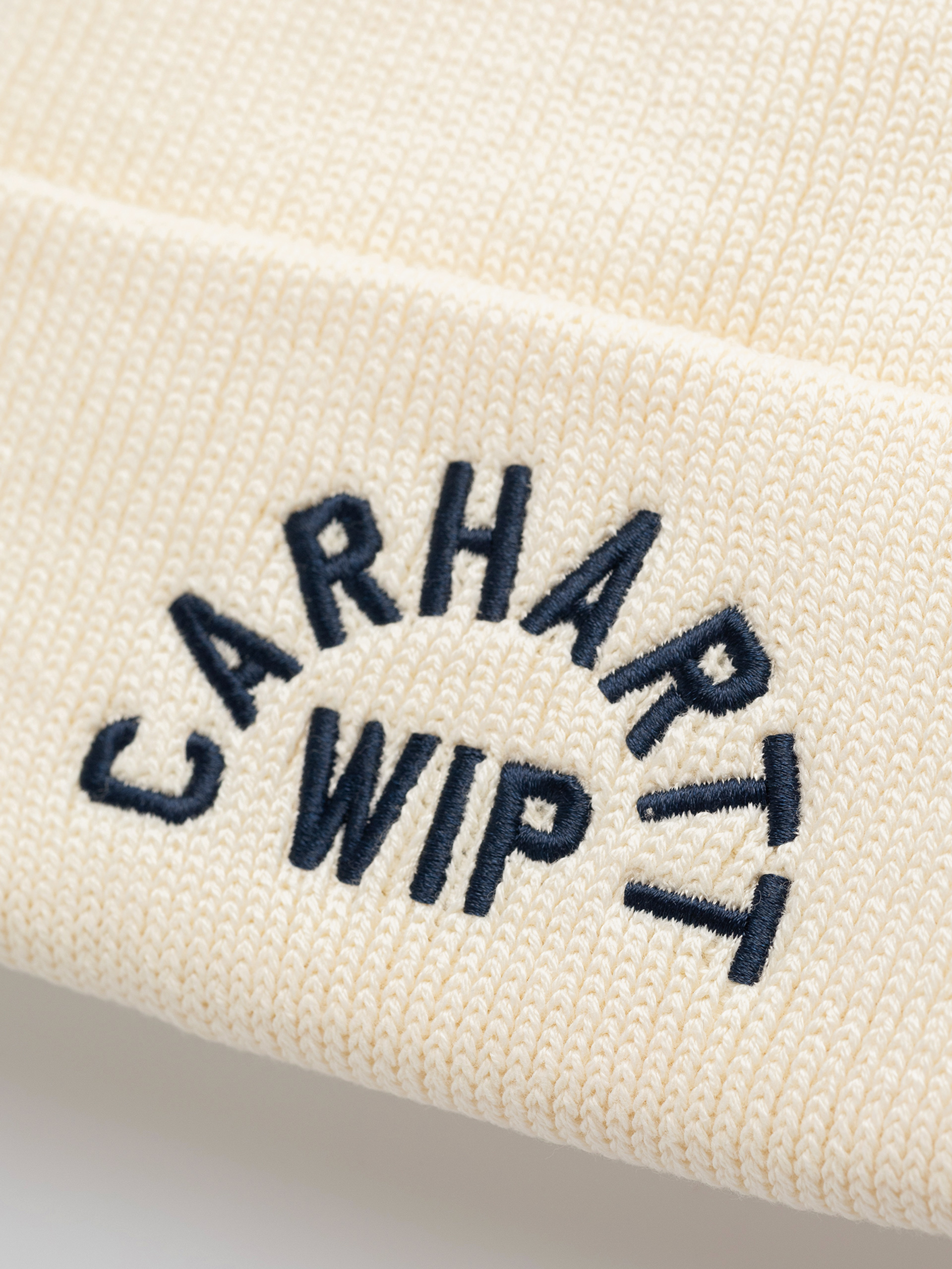Czapka zimowa Carhartt WIP Arch Script (natural/dark navy)
