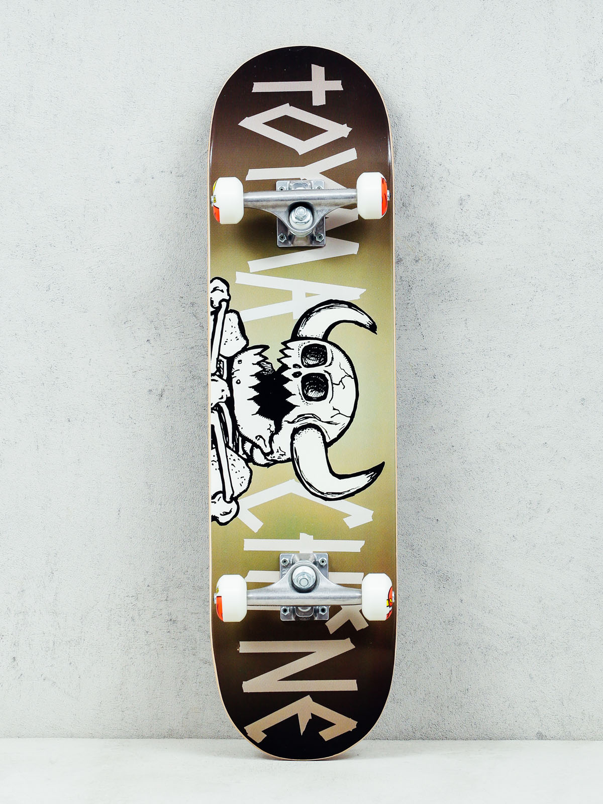 Deskorolka Toy Machine Skull Monster (brown gradient)