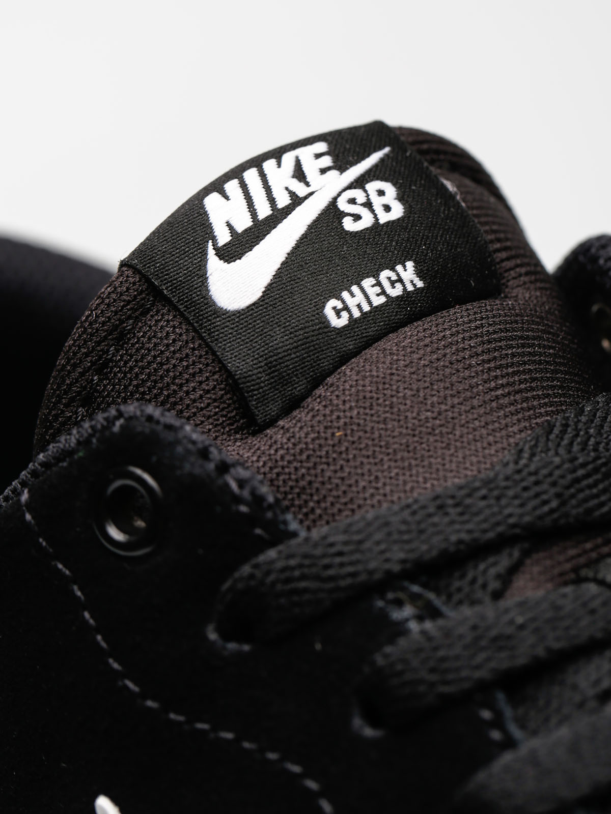 nike sb check solar black white