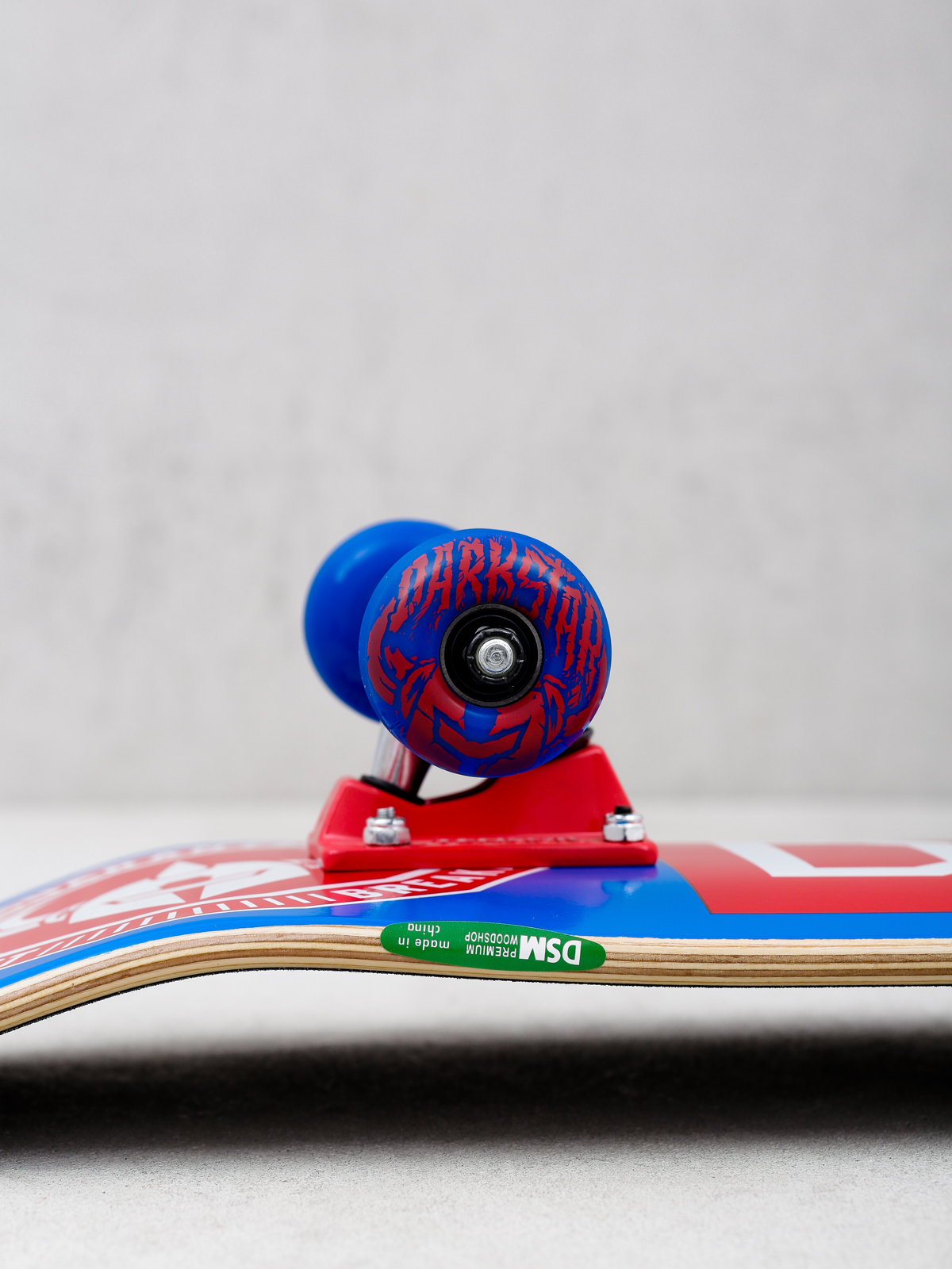 Deskorolka Darkstar Time Works (red/blue)